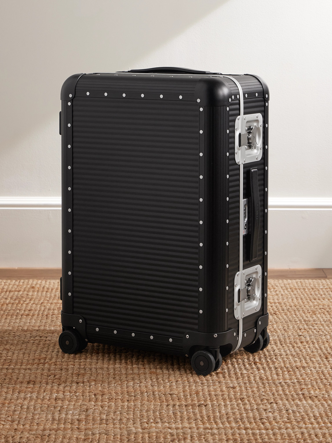 Fpm Milano Bank Spinner 68cm Leather-trimmed Aluminium Suitcase In Black