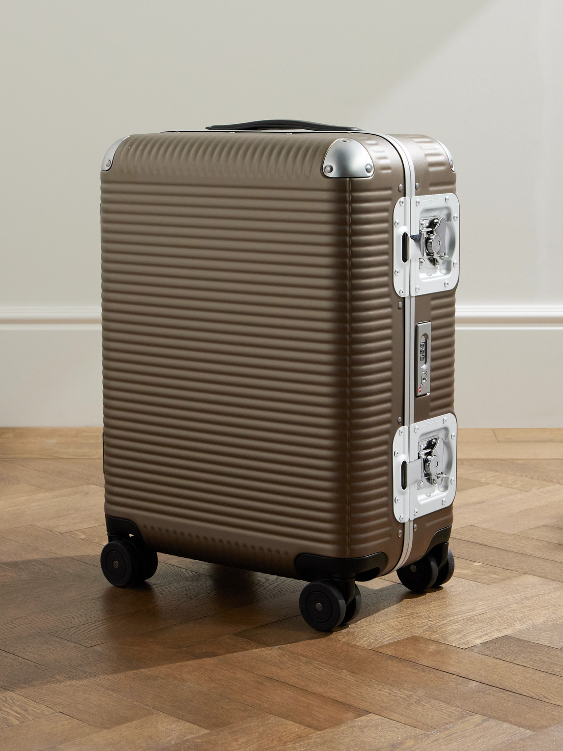 Fpm Milano Bank Spinner 55cm Leather And Aluminium-trimmed Makrolon® Polycarbonate Suitcase In Gold