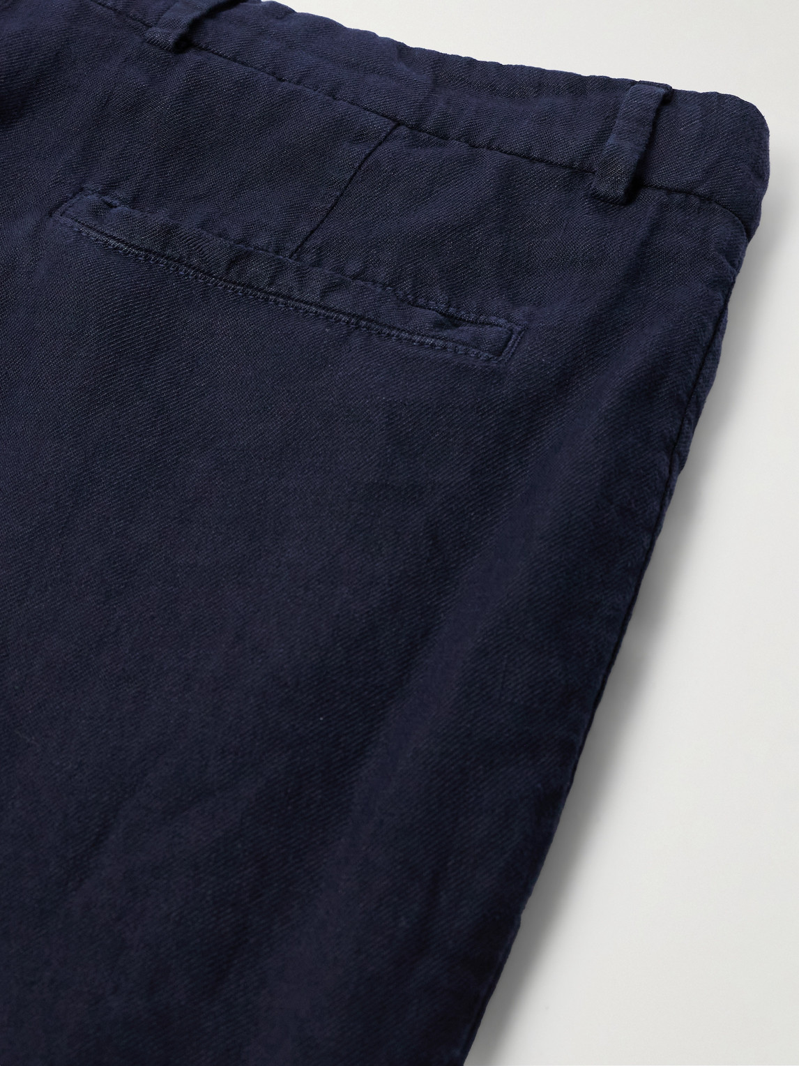 Brunello Cucinelli Tapered Pleated Linen-twill Trousers In Blue