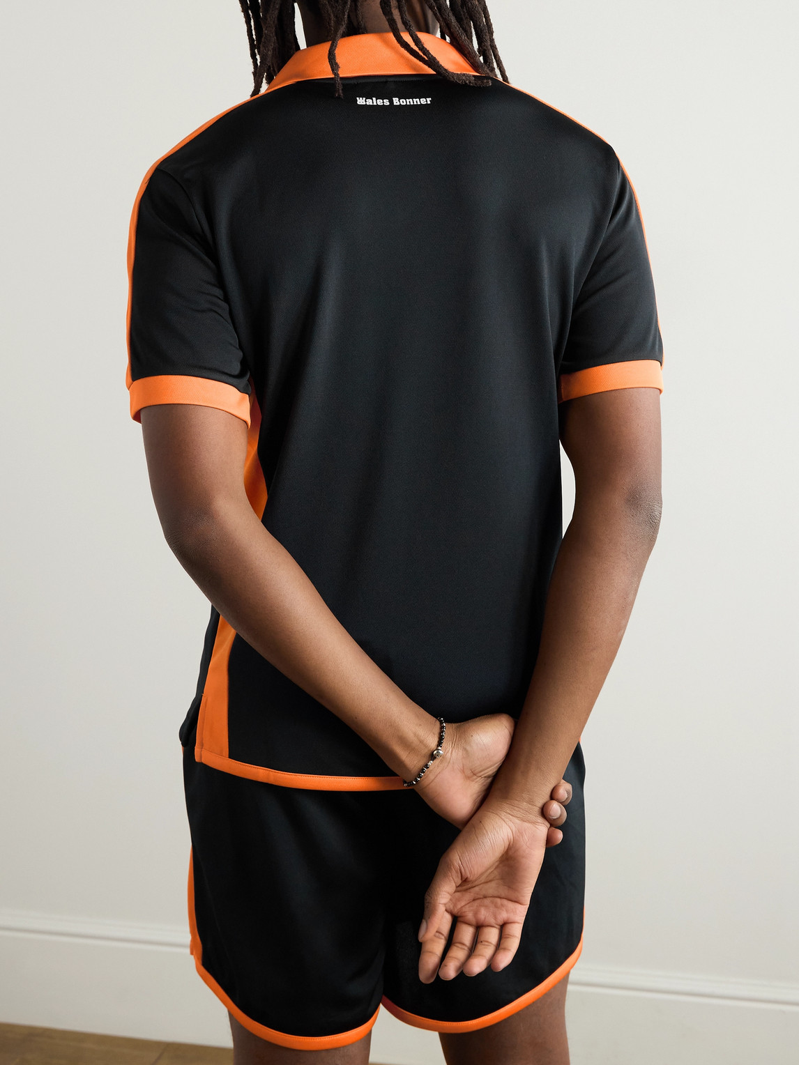 Shop Wales Bonner Slim-fit Logo-appliquéd Two-tone Tech-jersey Polo Shirt In Black
