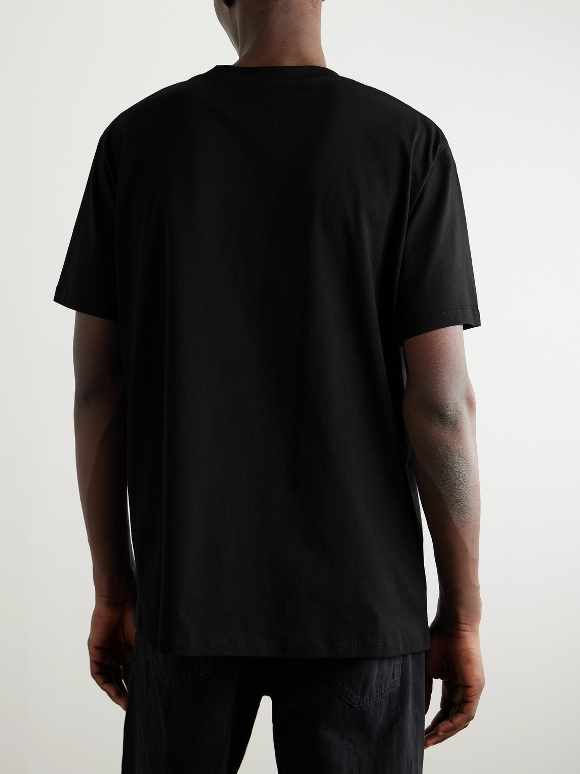 Shop Balmain Logo-flocked Cotton-jersey T-shirt In Black