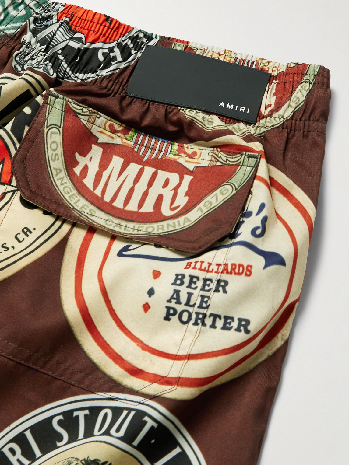 Shop Amiri Coasters Straight-leg Mid-length Logo-print Swim Shorts In Brown
