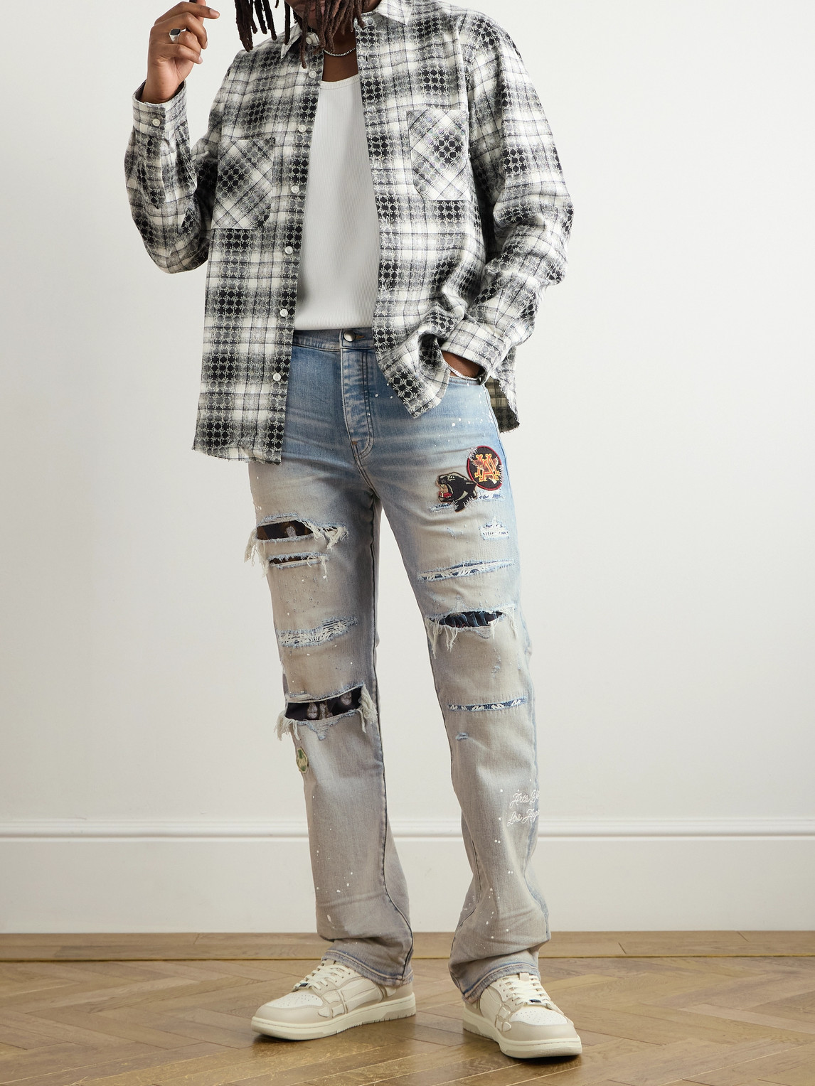 AMIRI SKINNY-FIT APPLIQUÉD DISTRESSED PAINT-SPLATTERED JEANS
