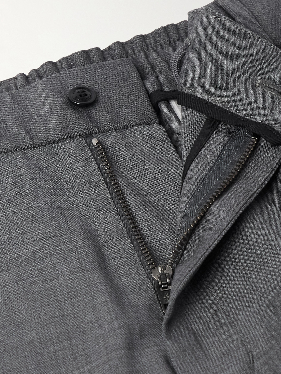 Moncler Tapered Logo-appliquéd Wool Trousers In Gray