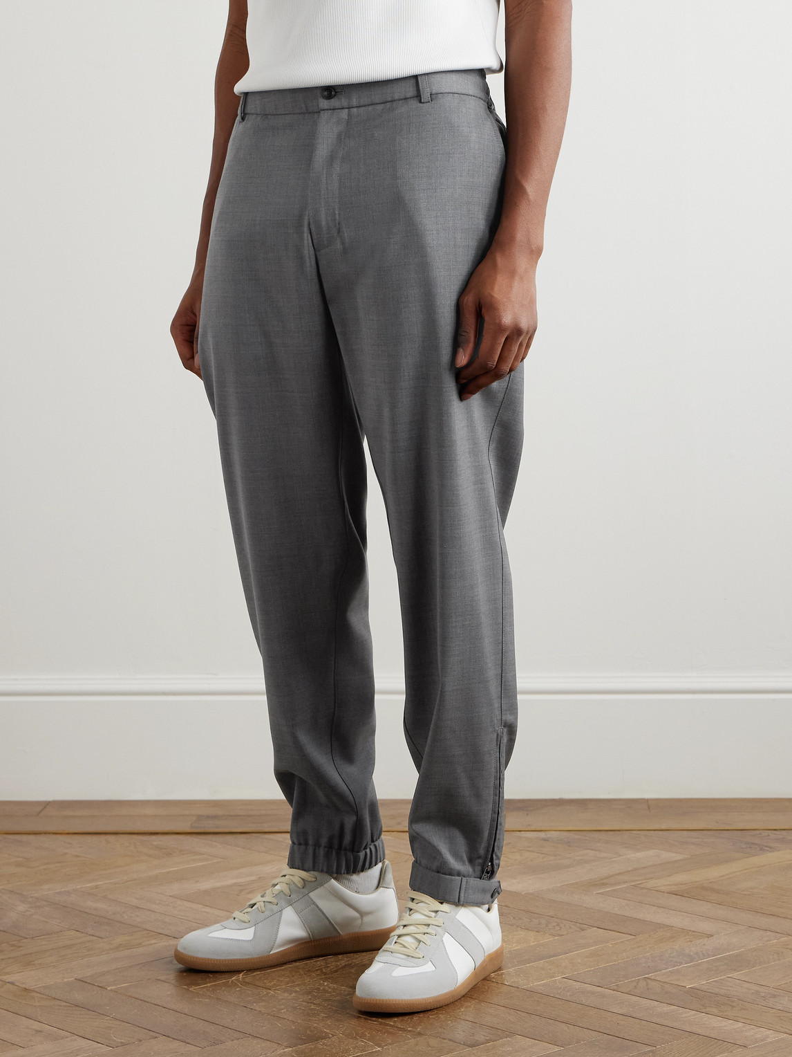 Moncler Tapered Logo-appliquéd Wool Trousers In Gray