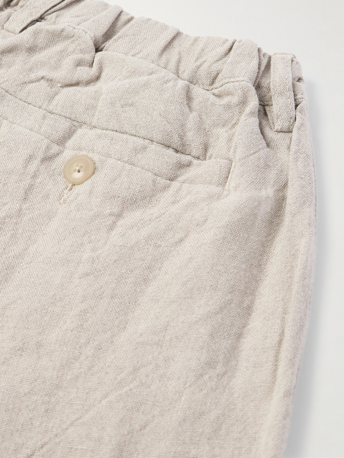 A Kind Of Guise Tapered Linen Trousers In Neutrals