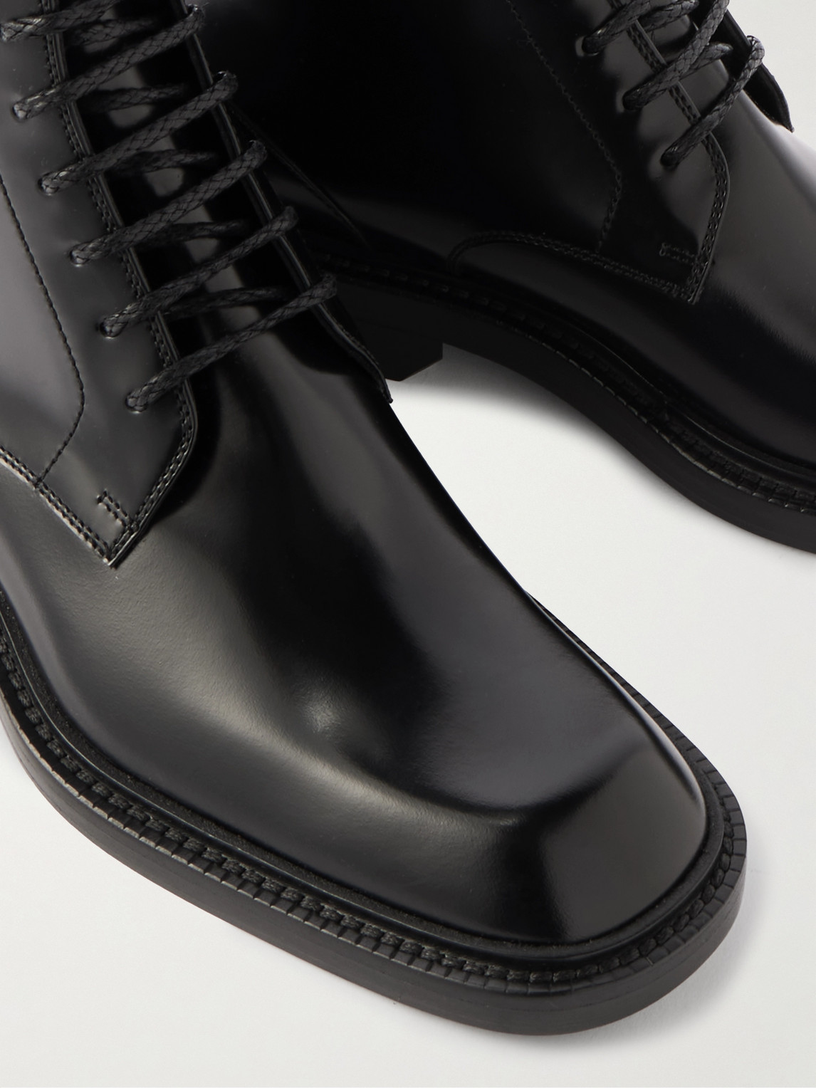 Saint Laurent Ian Glossed-leather Boots In Black