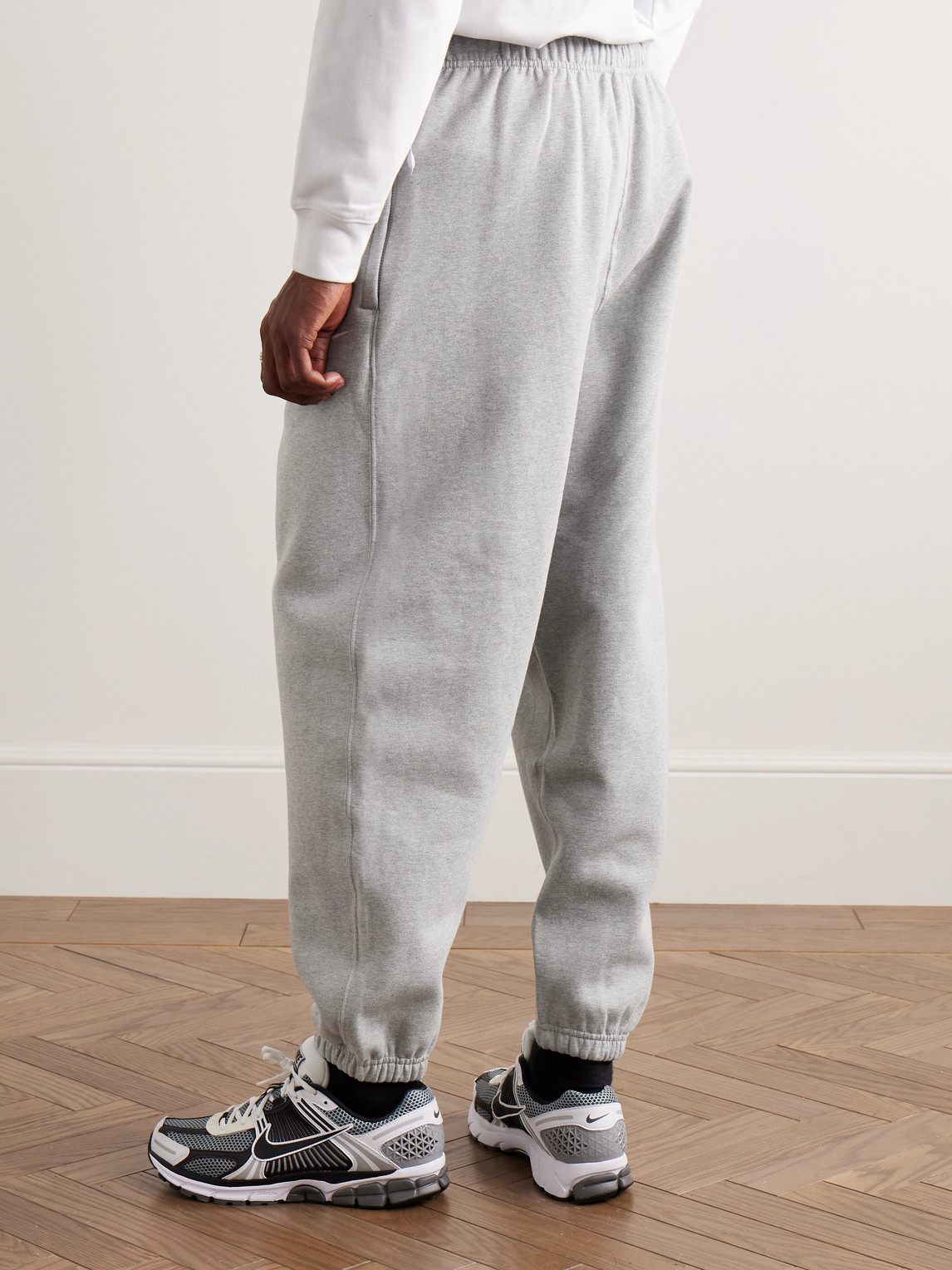 Shop Nike Solo Swoosh Tapered Logo-embroidered Cotton-blend Jersey Sweatpants In Gray