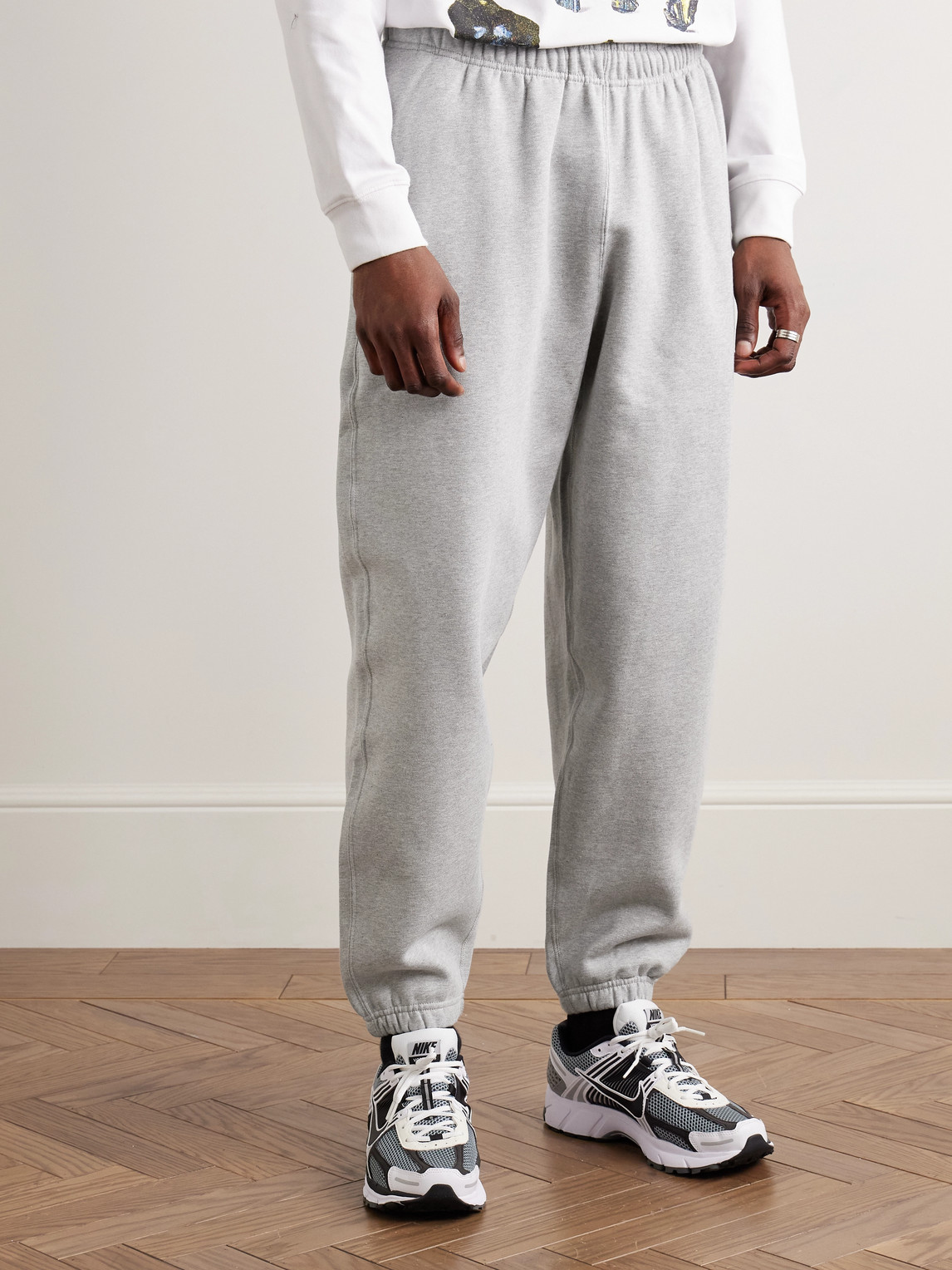 NIKE SOLO SWOOSH TAPERED LOGO-EMBROIDERED COTTON-BLEND JERSEY SWEATPANTS