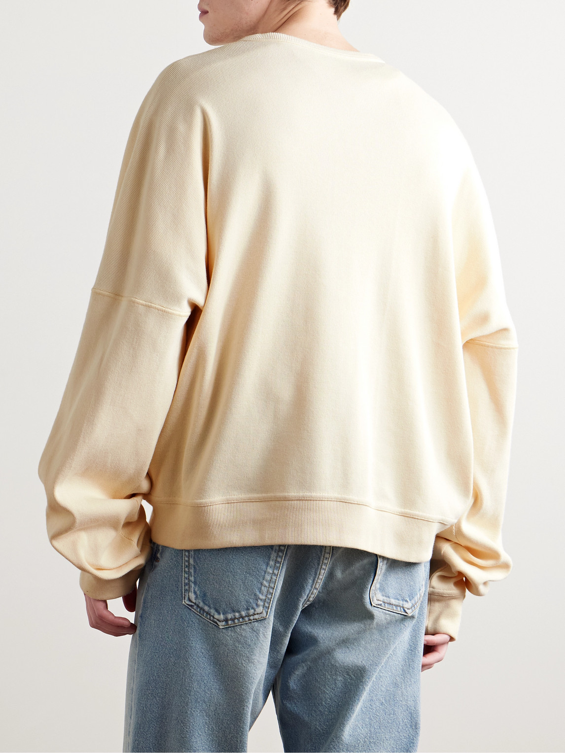 The Row Greto Ribbed Cotton-jersey Henley Sweatshirt In Neutral