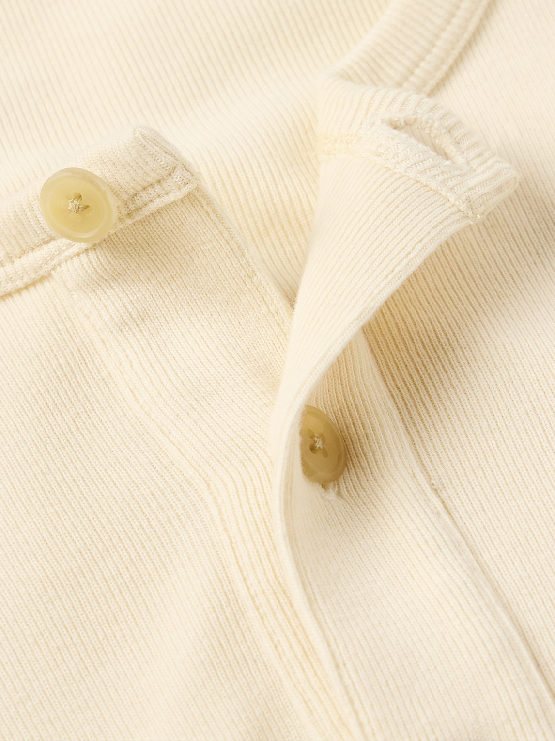 The Row Greto Ribbed Cotton-jersey Henley Sweatshirt In Neutral