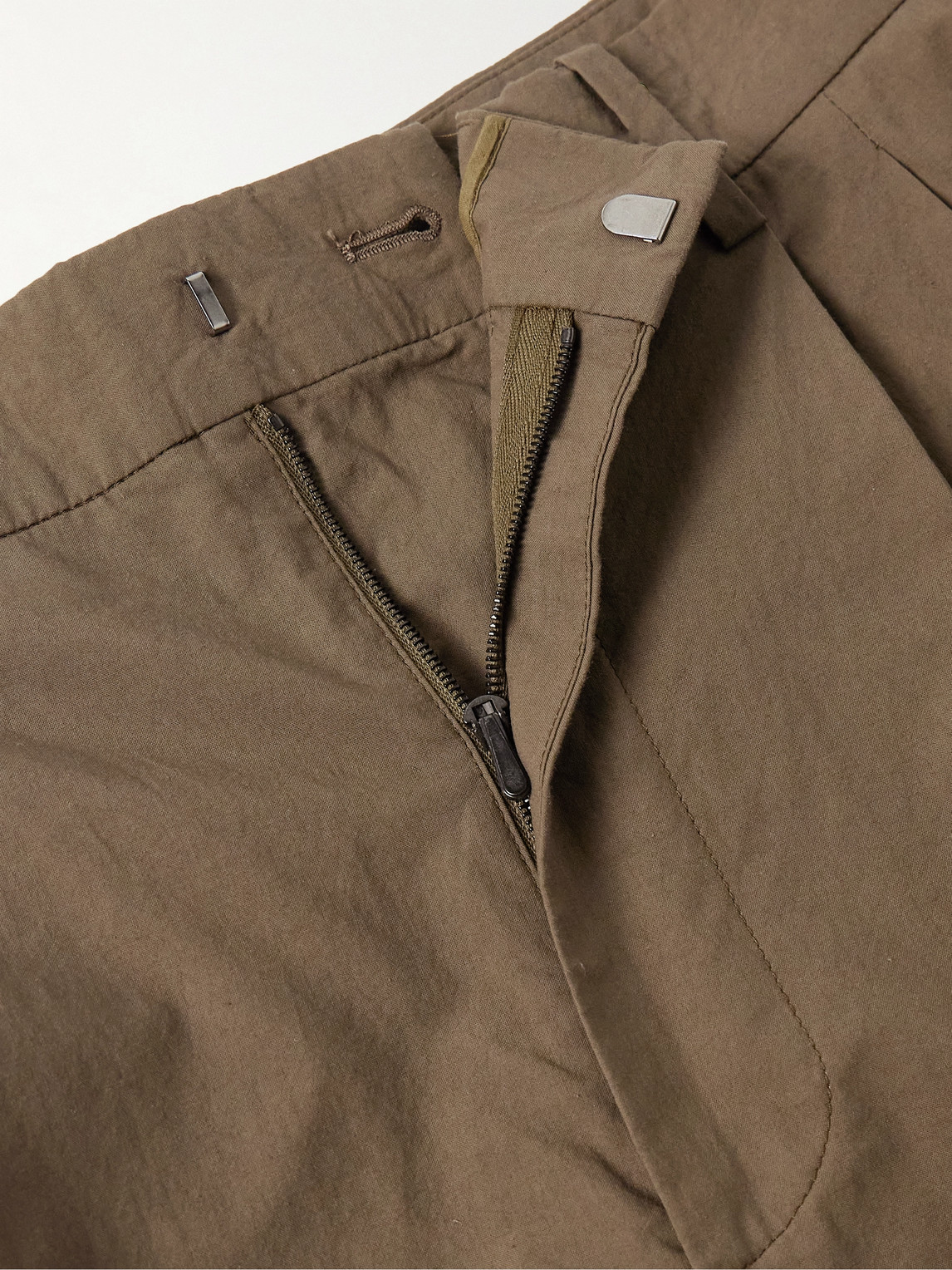 The Row Silas Tapered Pleated Cotton Trousers In Brown