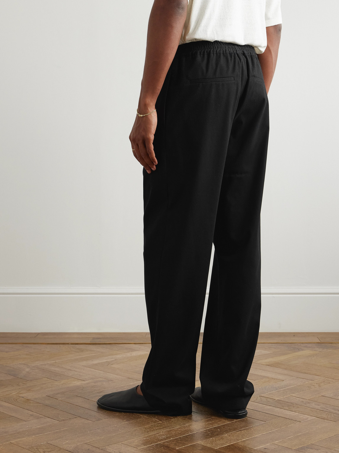 The Row Jonah Wide-leg Stretch Cotton And Cashmere-blend Trousers In Black