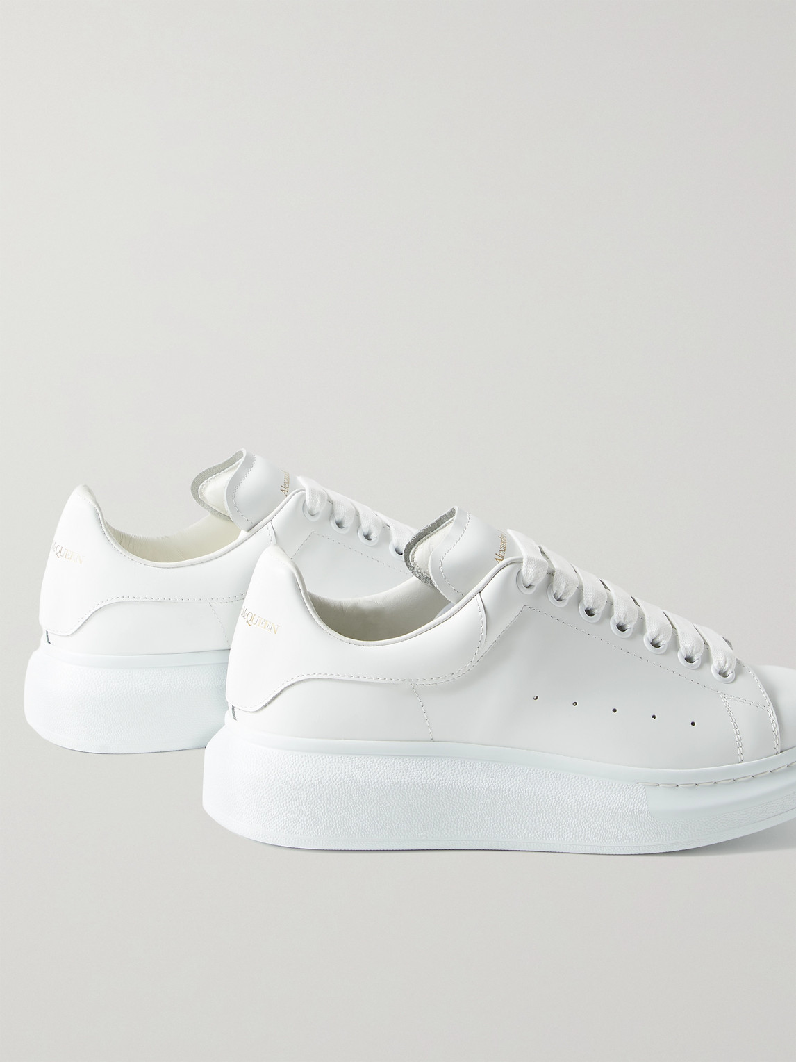 Alexander Mcqueen Exaggerated-sole Leather Sneakers In White