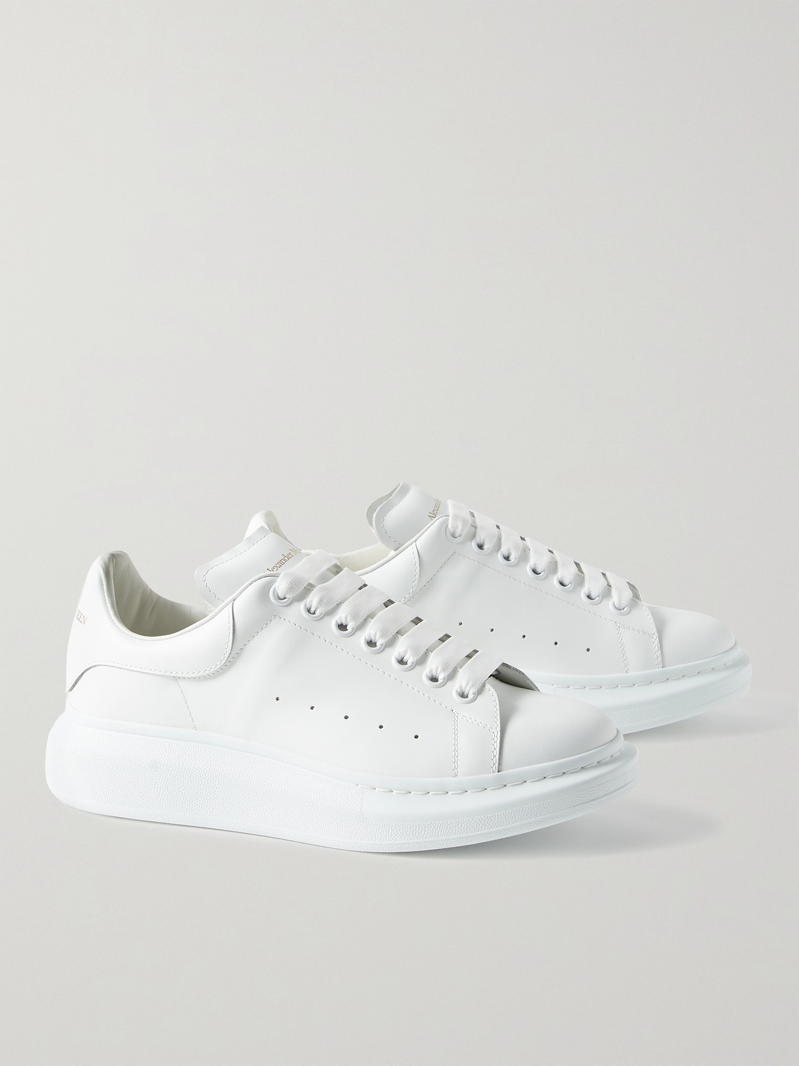 Alexander Mcqueen Exaggerated-sole Leather Sneakers In White