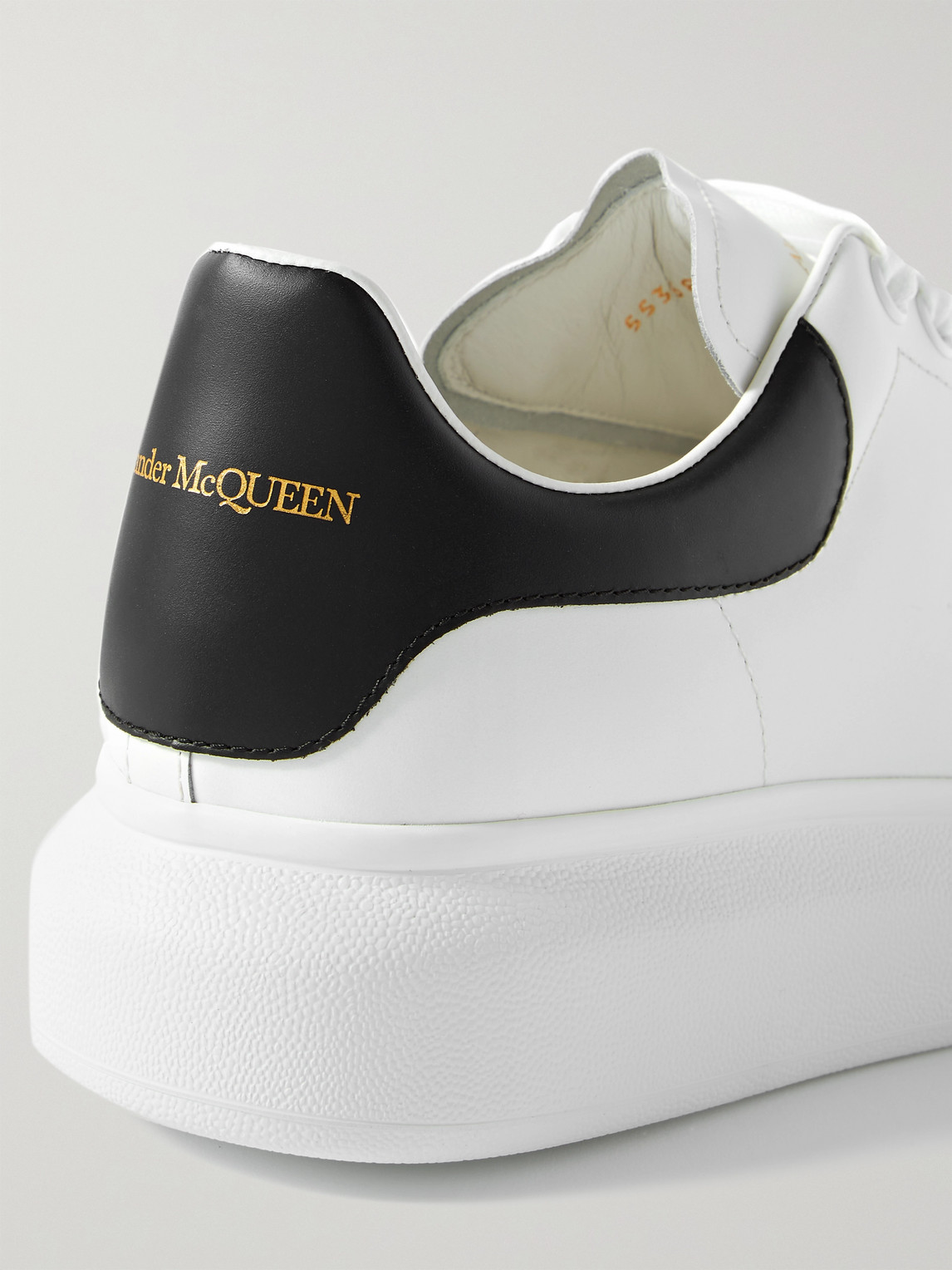 Shop Alexander Mcqueen Exaggerated-sole Leather Sneakers In White