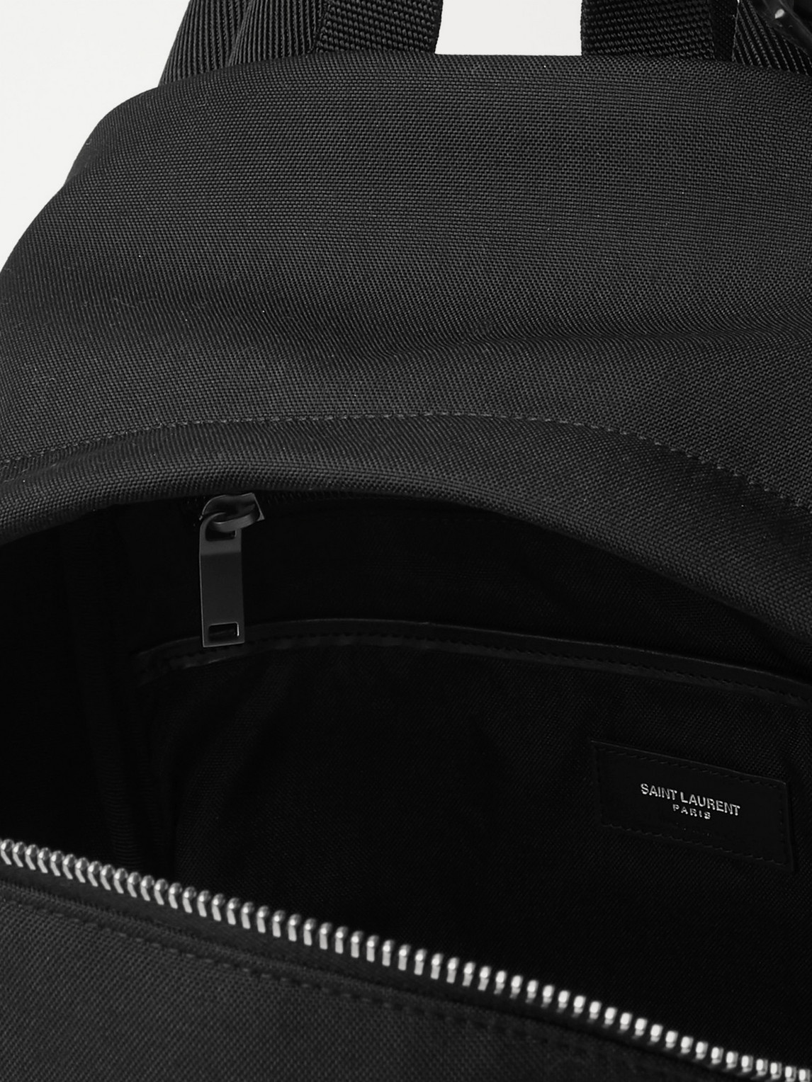 Shop Saint Laurent Leather-trimmed Canvas Backpack In Black