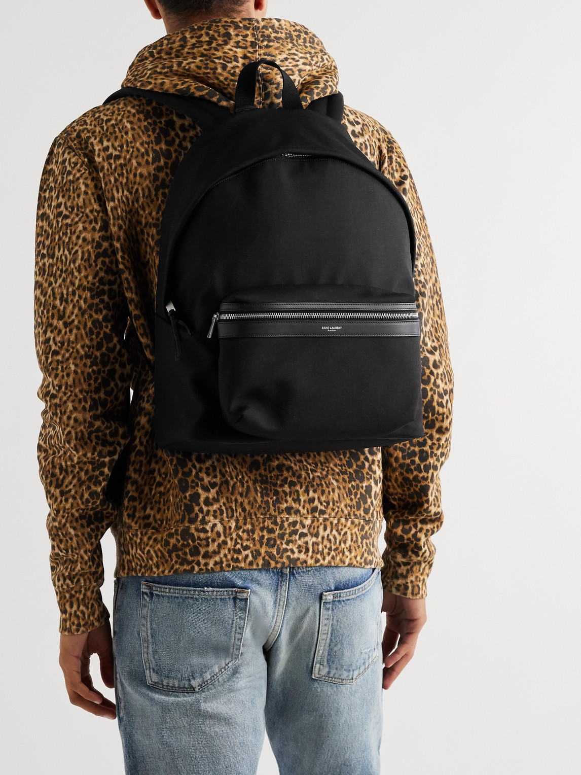 Shop Saint Laurent Leather-trimmed Canvas Backpack In Black