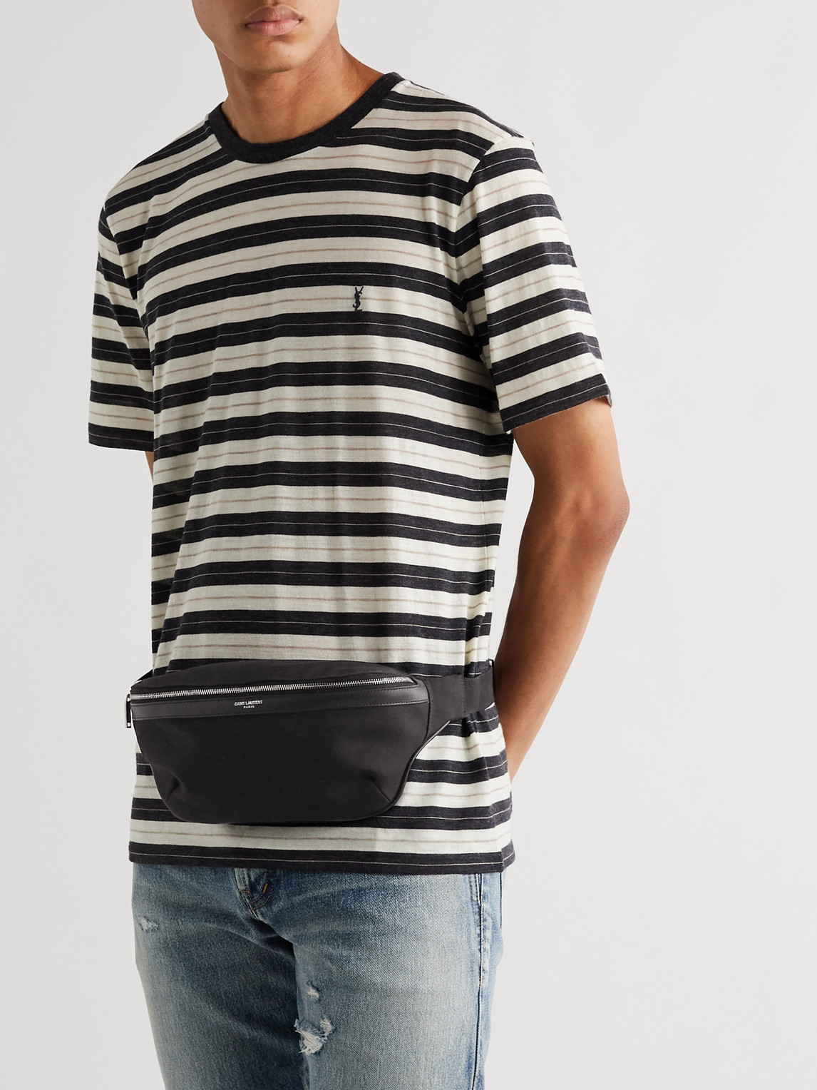 Shop Saint Laurent Leather-trimmed Canvas Belt Bag In Black