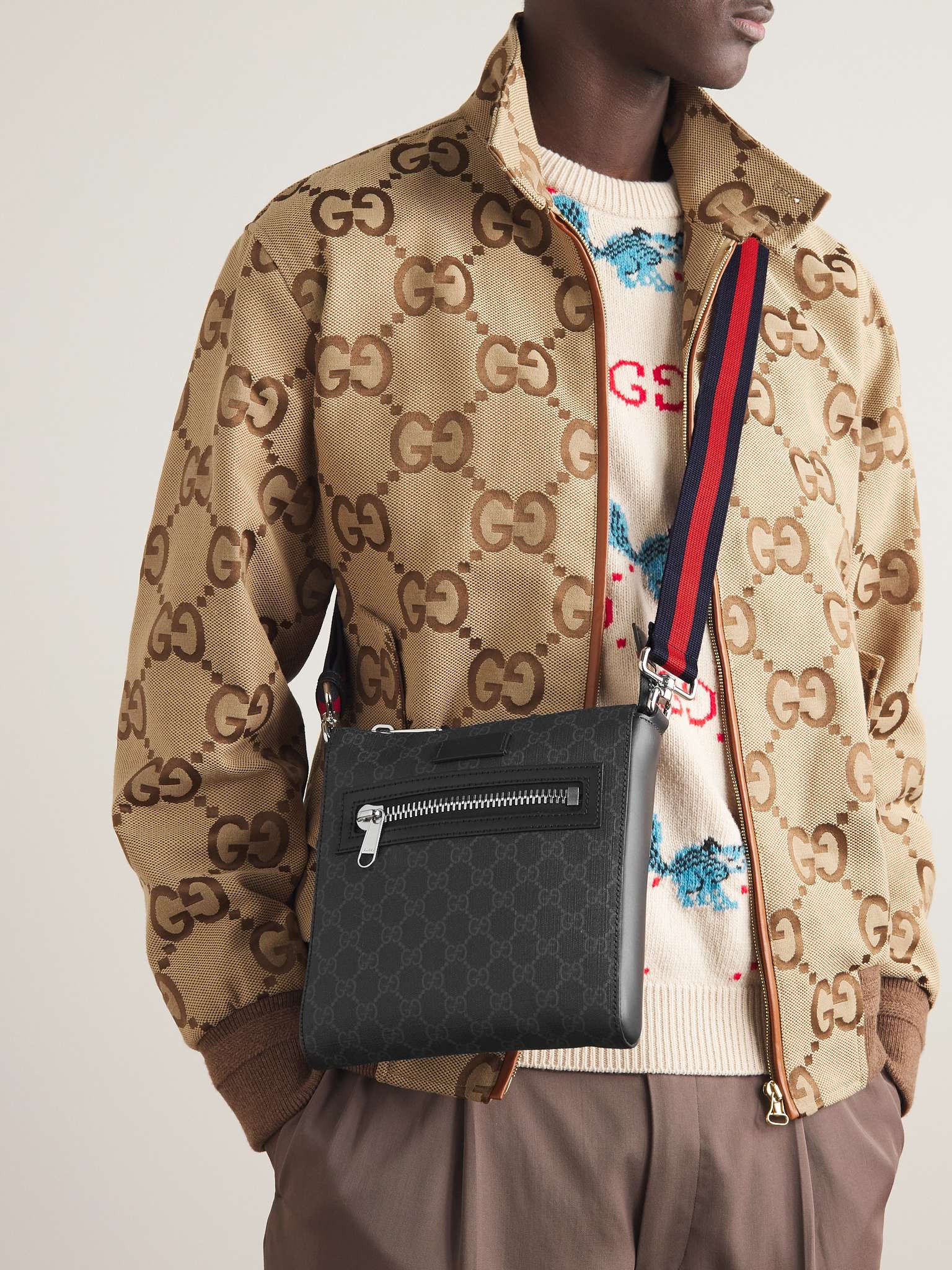 GUCCI Leather-Trimmed Monogrammed Coated-Canvas Messenger Bag for Men ...