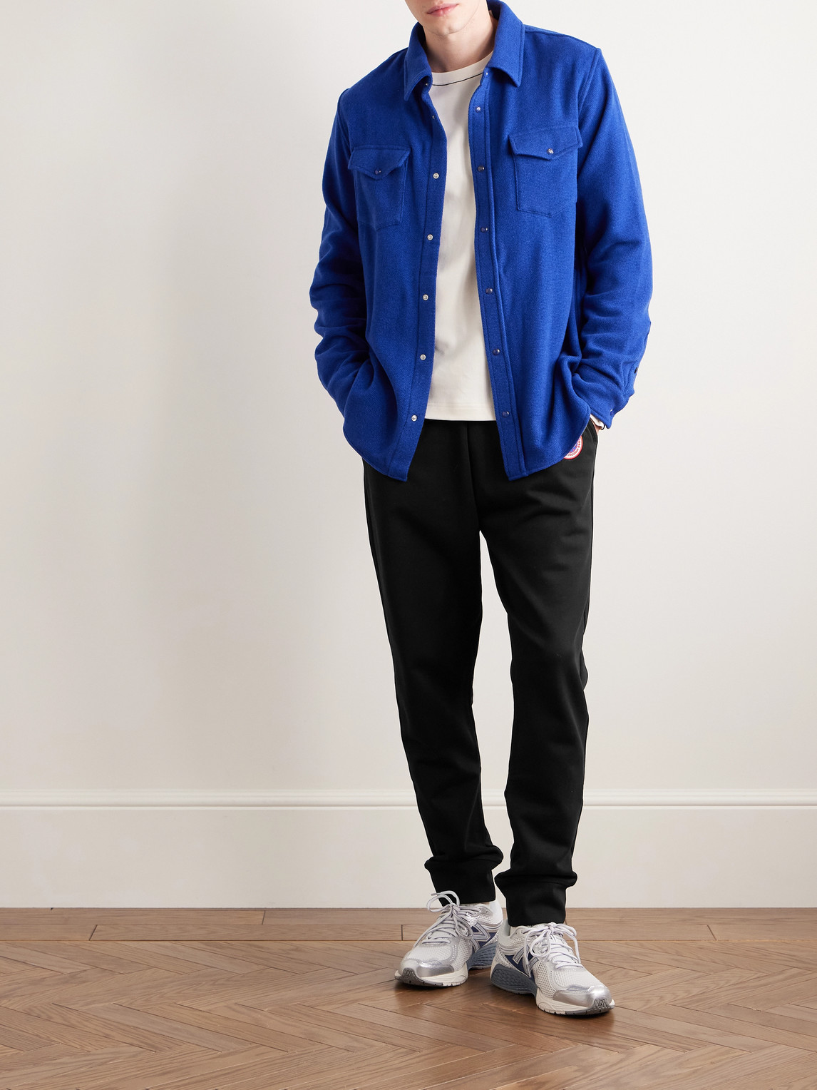 Shop Canada Goose Huron Tapered Logo-appliquéd Cotton-jersey Sweatpants In Black