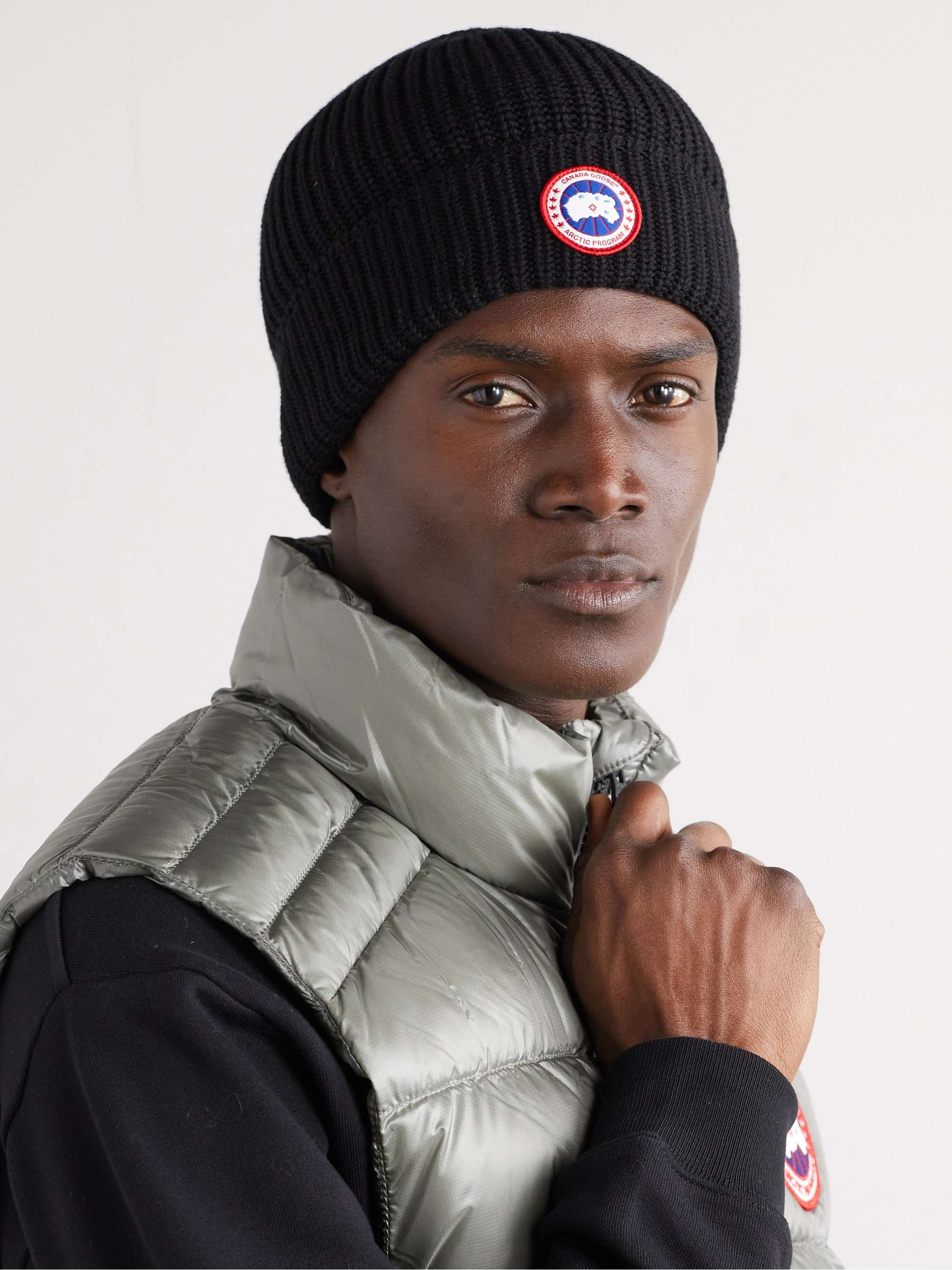 CANADA GOOSE Logo-Appliquéd Ribbed Merino Wool Beanie for Men | MR PORTER