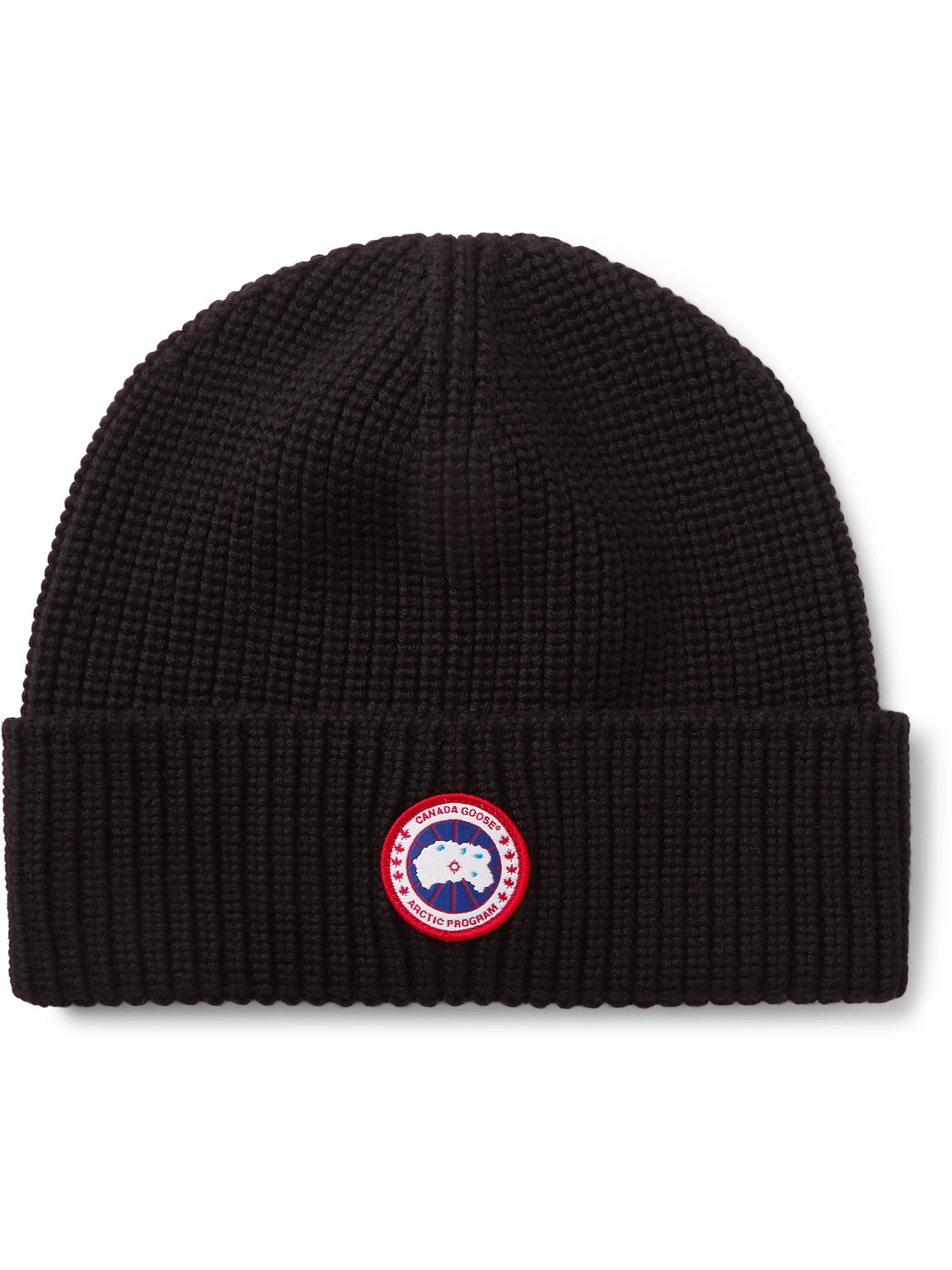 Shop Canada Goose Logo-appliquéd Ribbed Merino Wool Beanie In Black