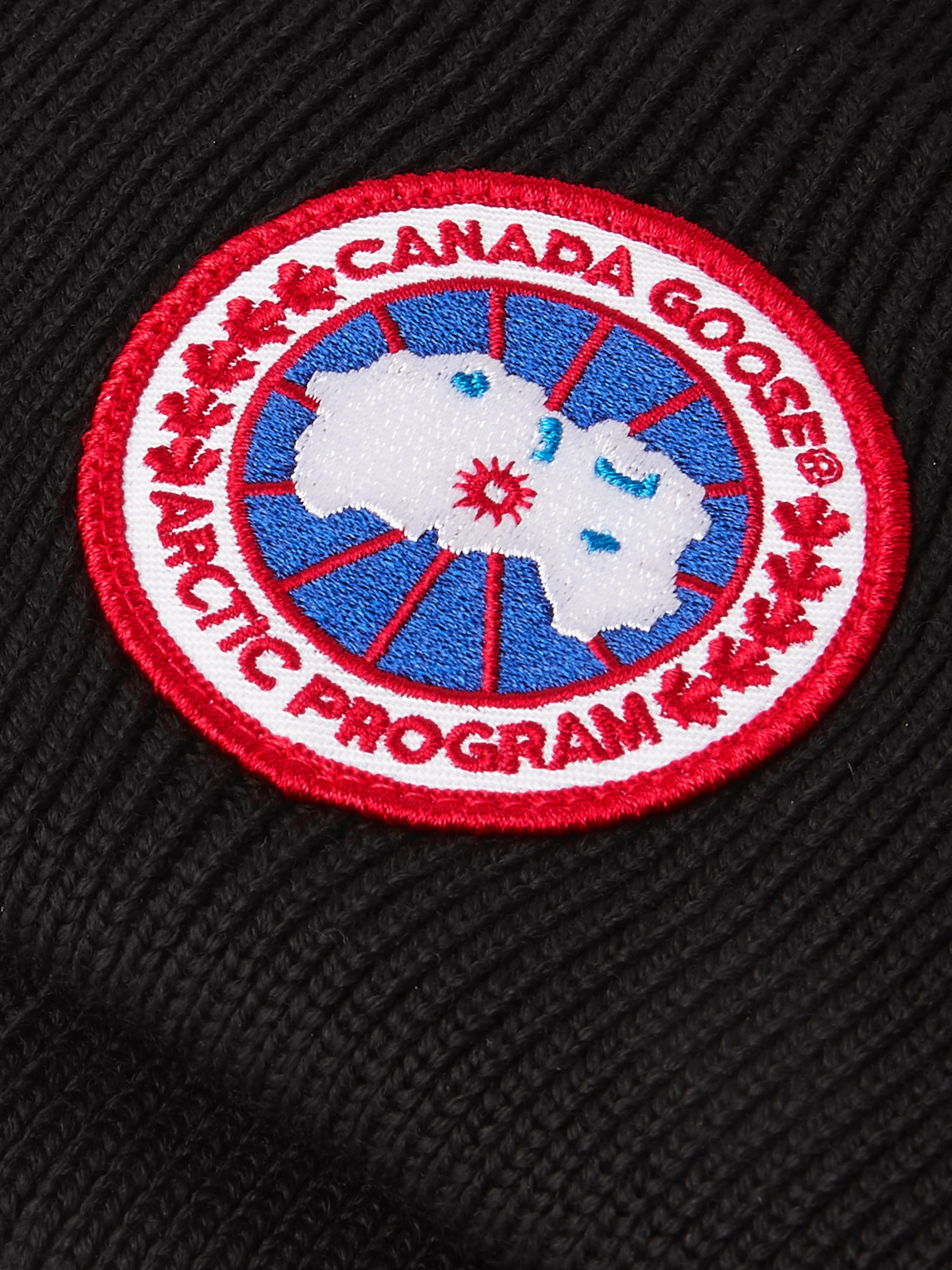 Shop Canada Goose Logo-appliquéd Merino Wool Beanie In Black