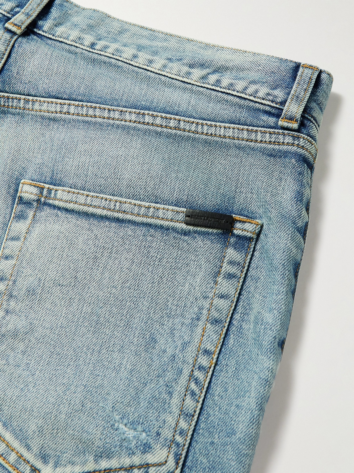 Shop Saint Laurent Skinny-fit Distressed Jeans In Blue