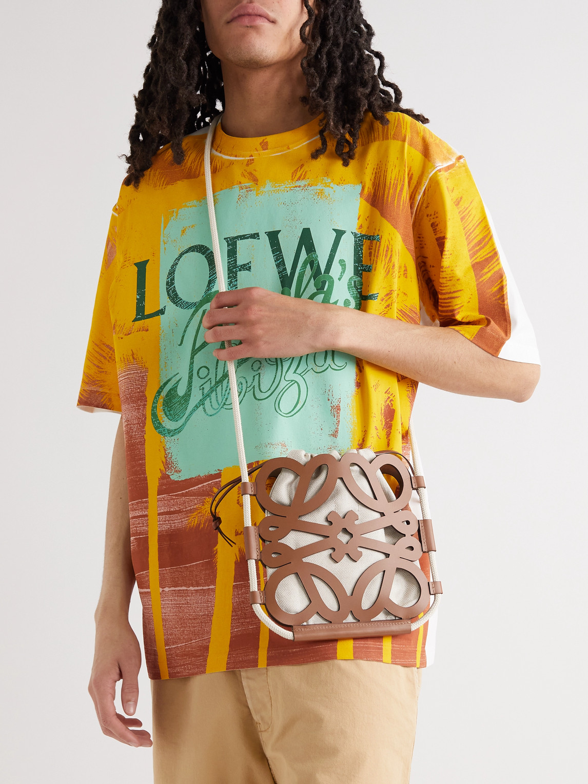 Shop Loewe Paula's Ibiza Anagram Cutout Leather And Herringbone Canvas Pouch In Brown