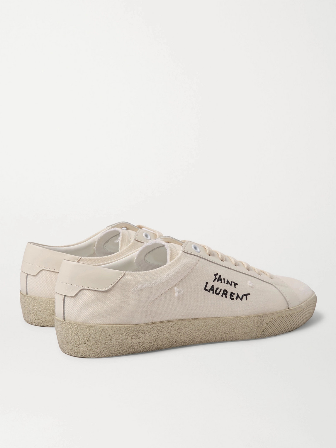 Shop Saint Laurent Sl/06 Court Classic Leather-trimmed Logo-embroidered Distressed Canvas Sneakers In White