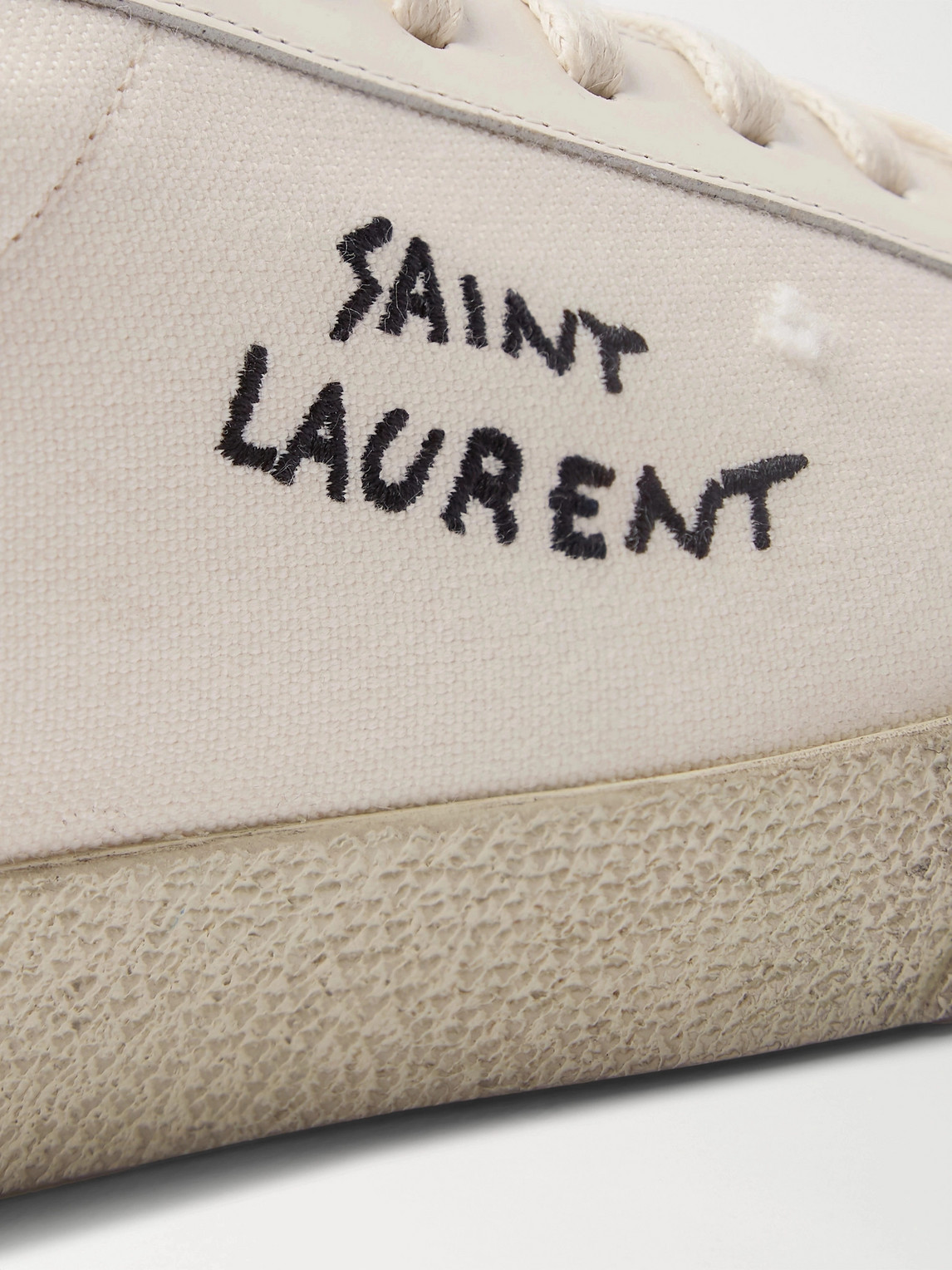 Shop Saint Laurent Sl/06 Court Classic Leather-trimmed Logo-embroidered Distressed Canvas Sneakers In White