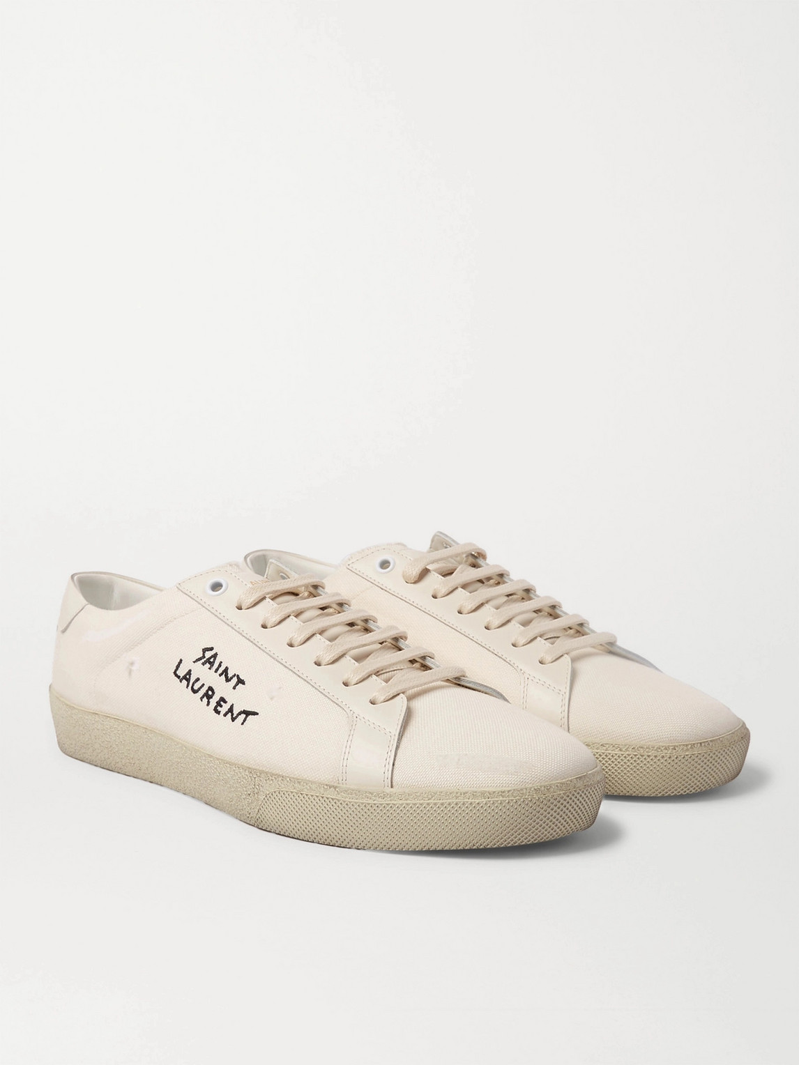 Shop Saint Laurent Sl/06 Court Classic Leather-trimmed Logo-embroidered Distressed Canvas Sneakers In White