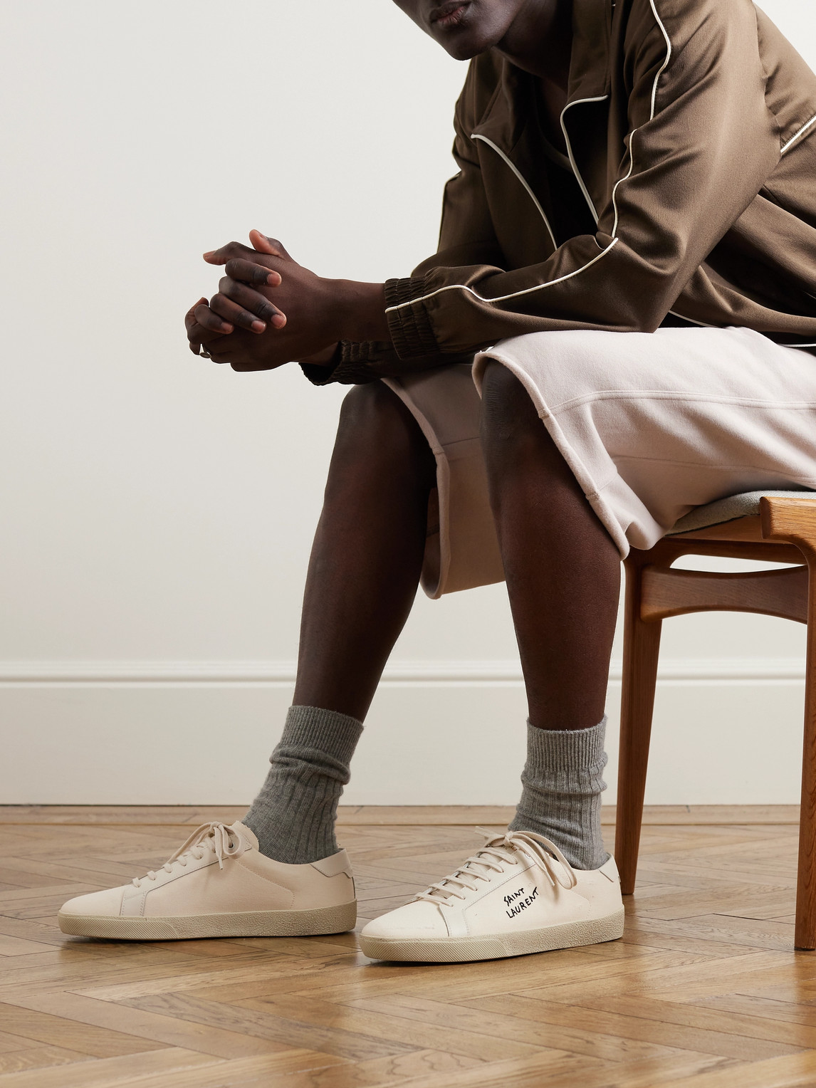 Shop Saint Laurent Sl/06 Court Classic Leather-trimmed Logo-embroidered Distressed Canvas Sneakers In White