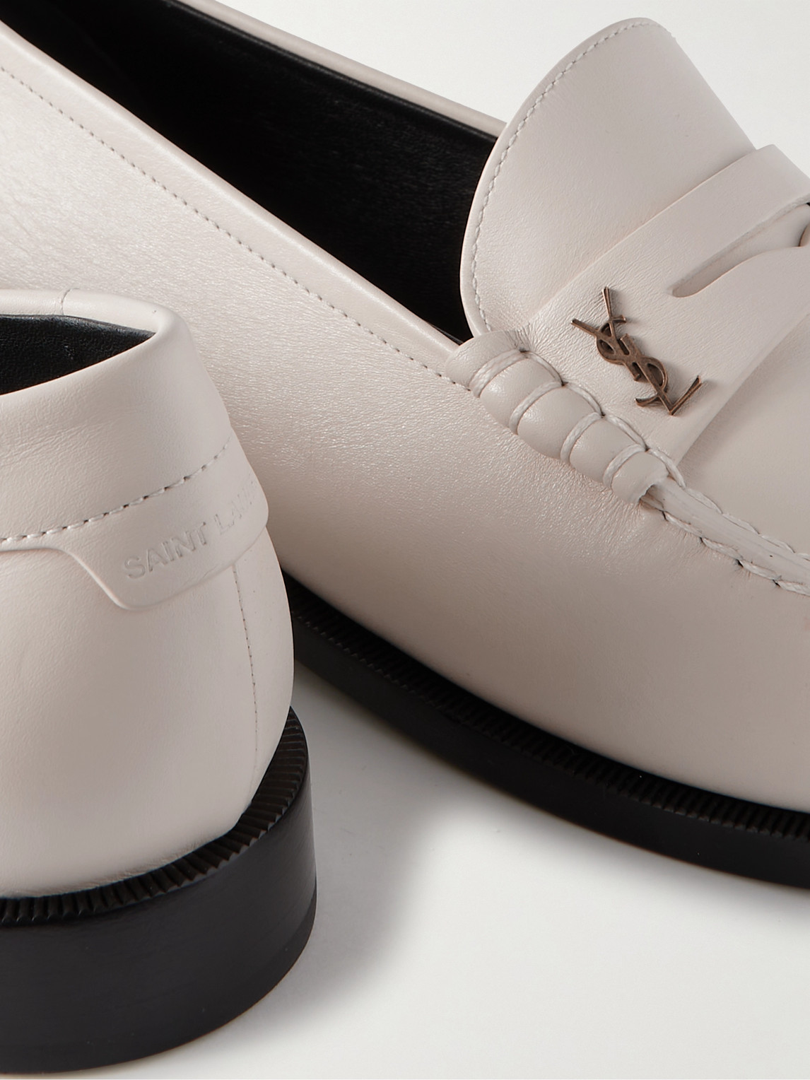 Shop Saint Laurent Logo-embellished Leather Penny Loafers In White