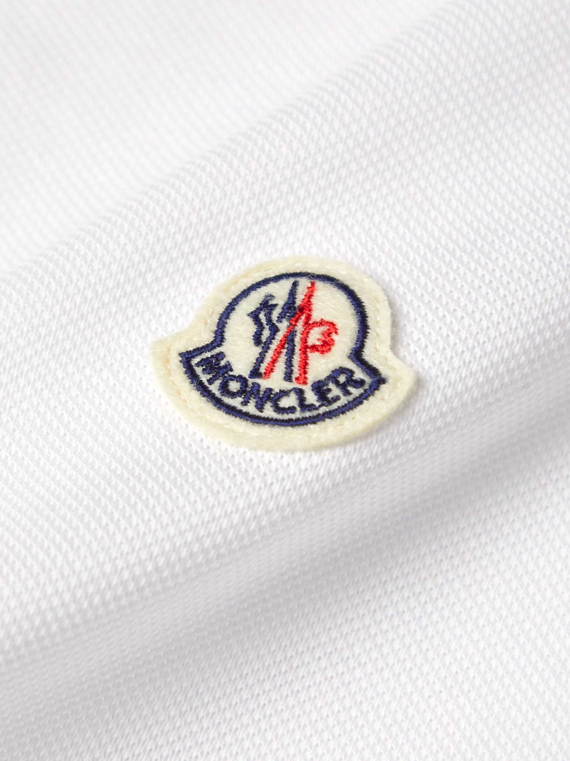 MONCLER Polo in cotone piqué con righe e logo applicato