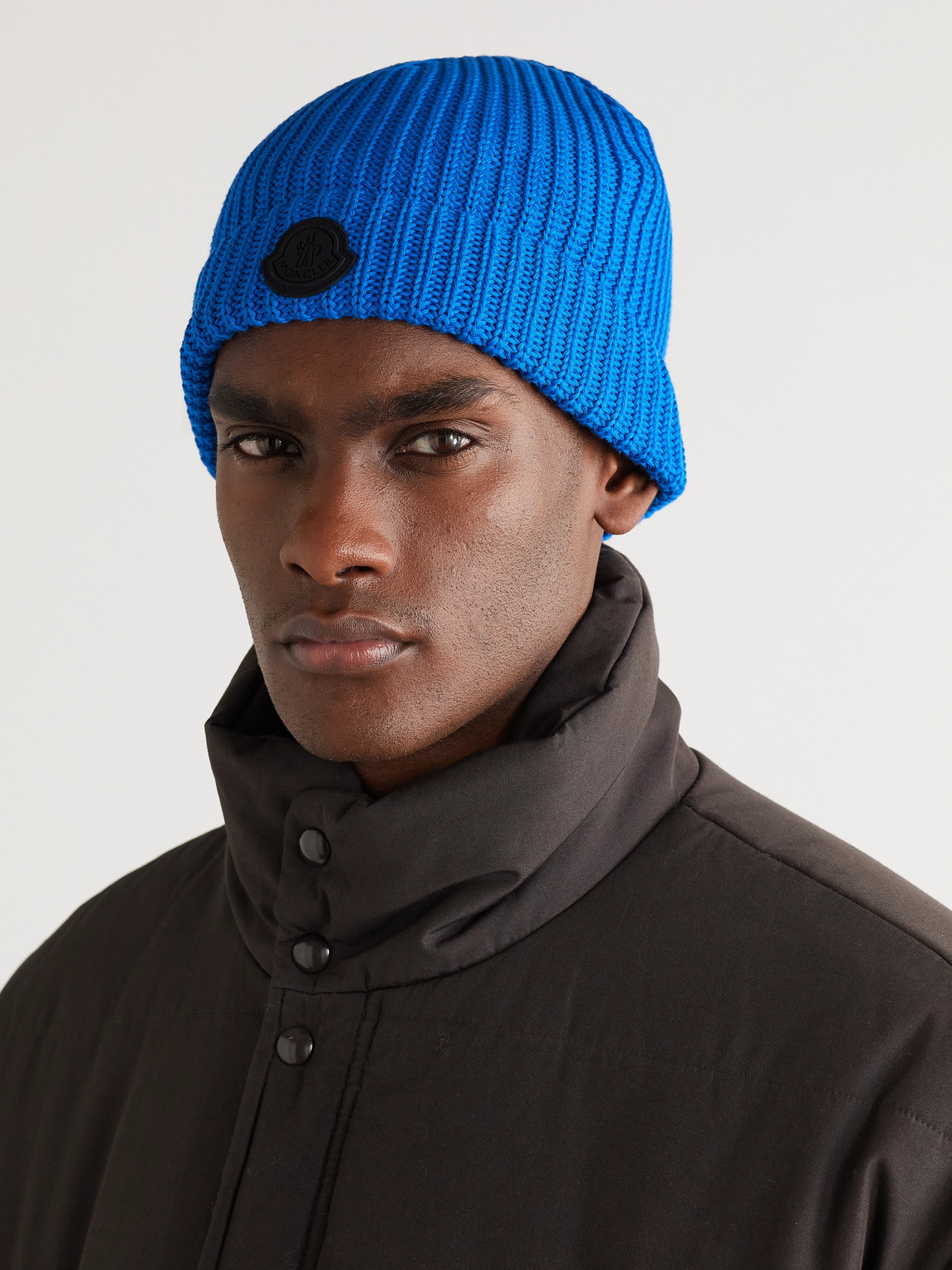 Shop Moncler Logo-appliquéd Ribbed Cotton Beanie In Blue