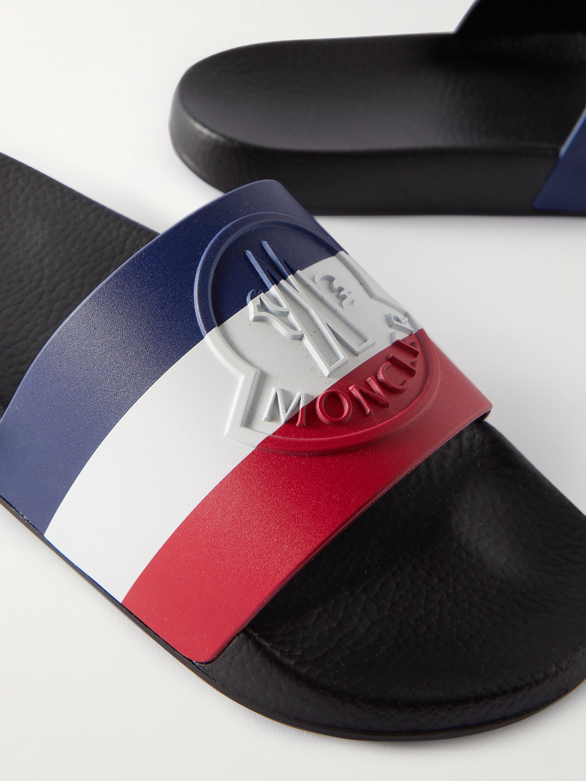 Shop Moncler Basile Logo-embossed Striped Rubber Slides In Black