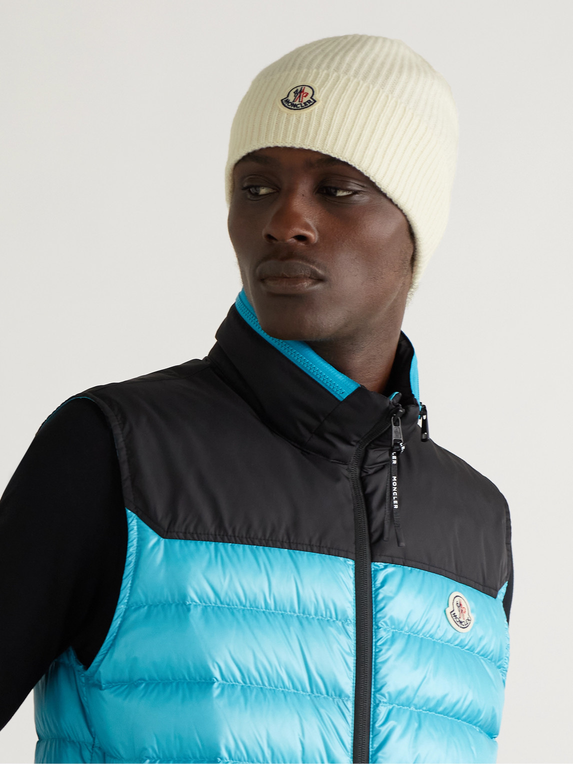 MONCLER APPLIQUÉD RIBBED VIRGIN WOOL AND CASHMERE-BLEND BEANIE