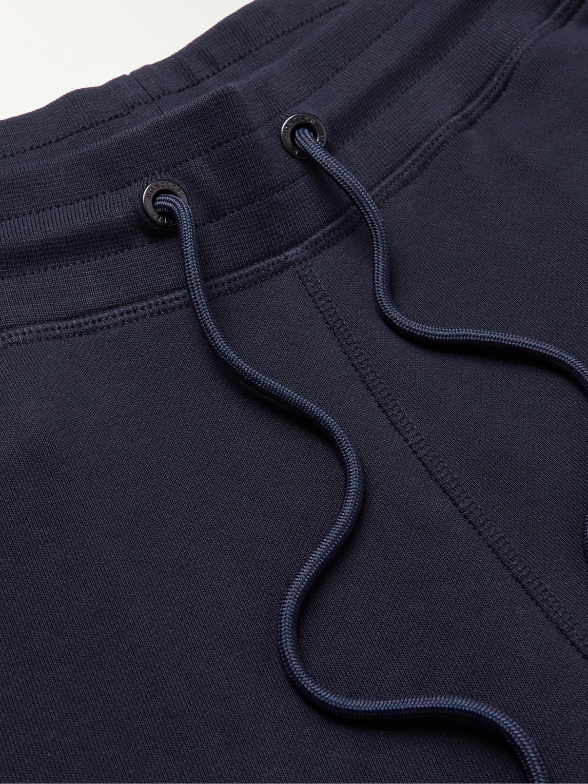 Shop Moncler Genius 2 Moncler 1952 Tapered Logo-appliquéd Cotton-jersey Sweatpants In Blue