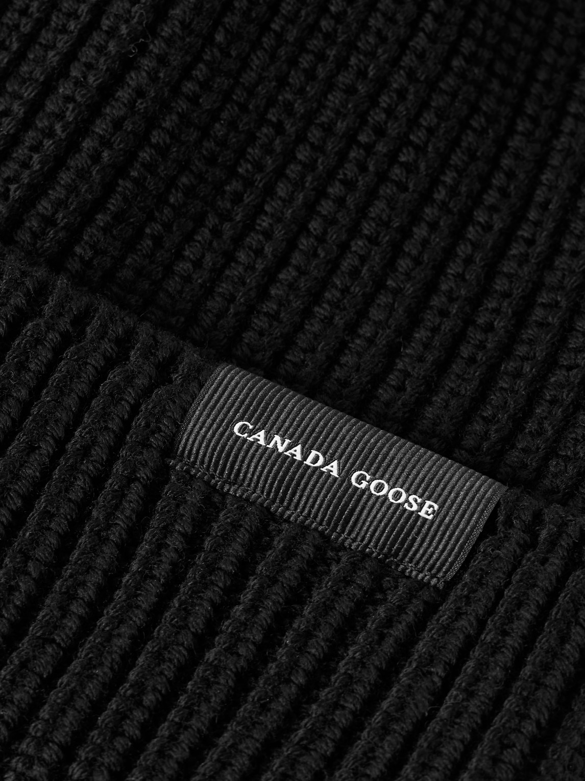 Canada Goose Logo-appliquéd Ribbed Wool Beanie In Black