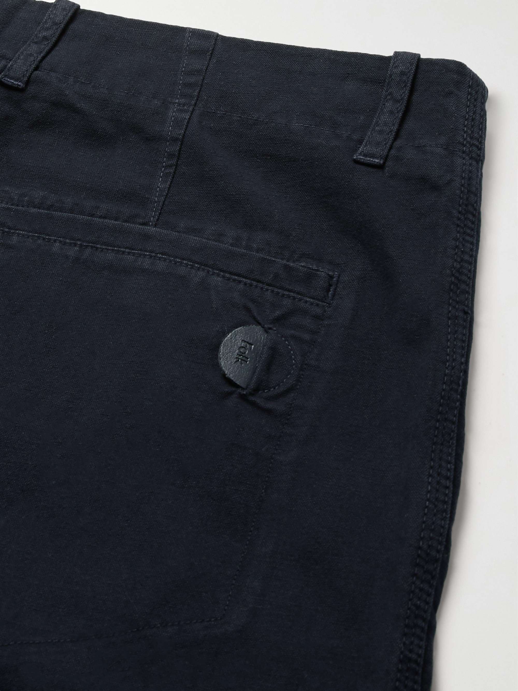 FOLK Navy Assembly Tapered Pleated Cotton-Canvas Trousers
