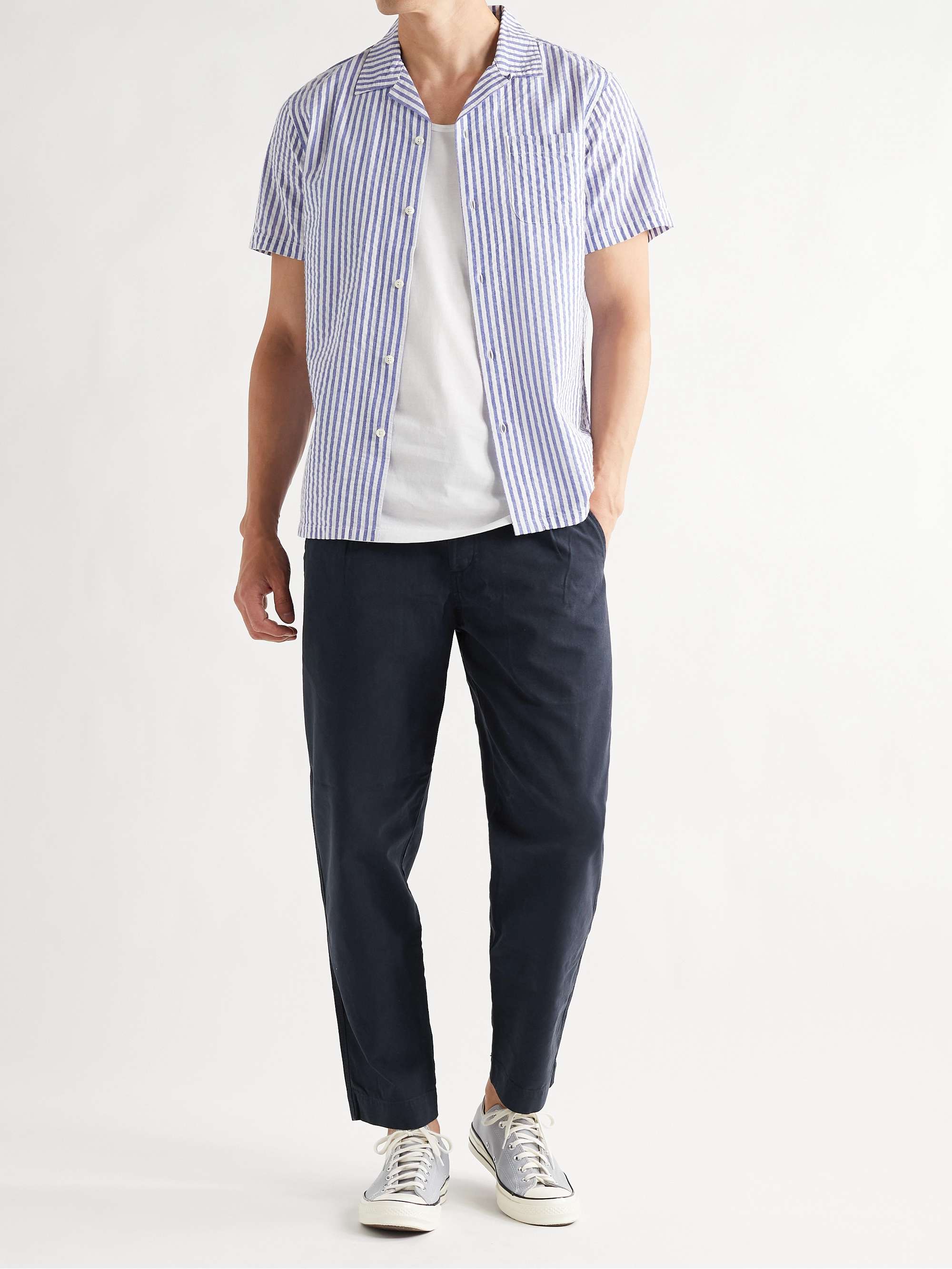 FOLK Navy Assembly Tapered Pleated Cotton-Canvas Trousers