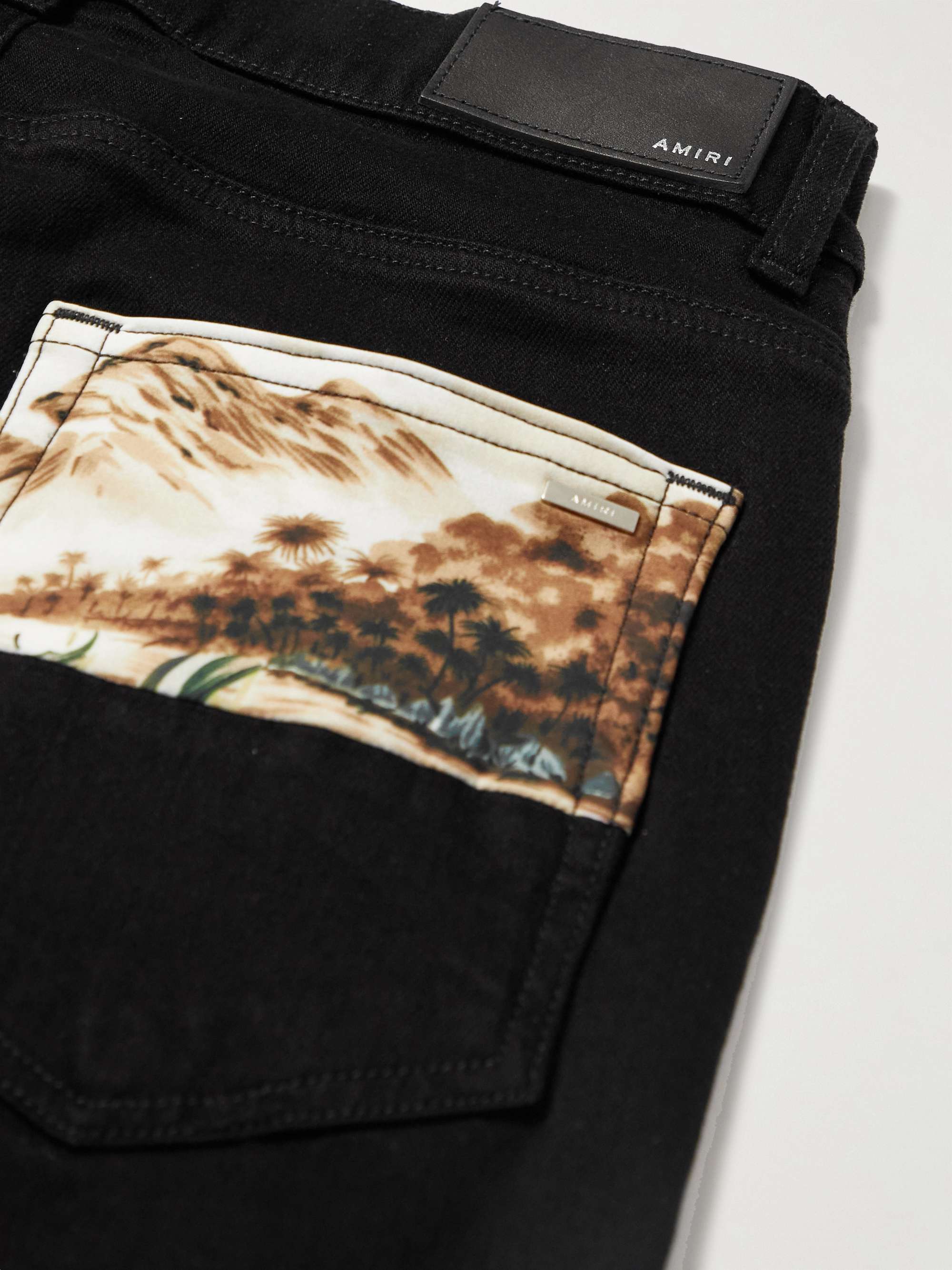 AMIRI Skinny-Fit Leather-Appliquéd Panelled Distressed Jeans
