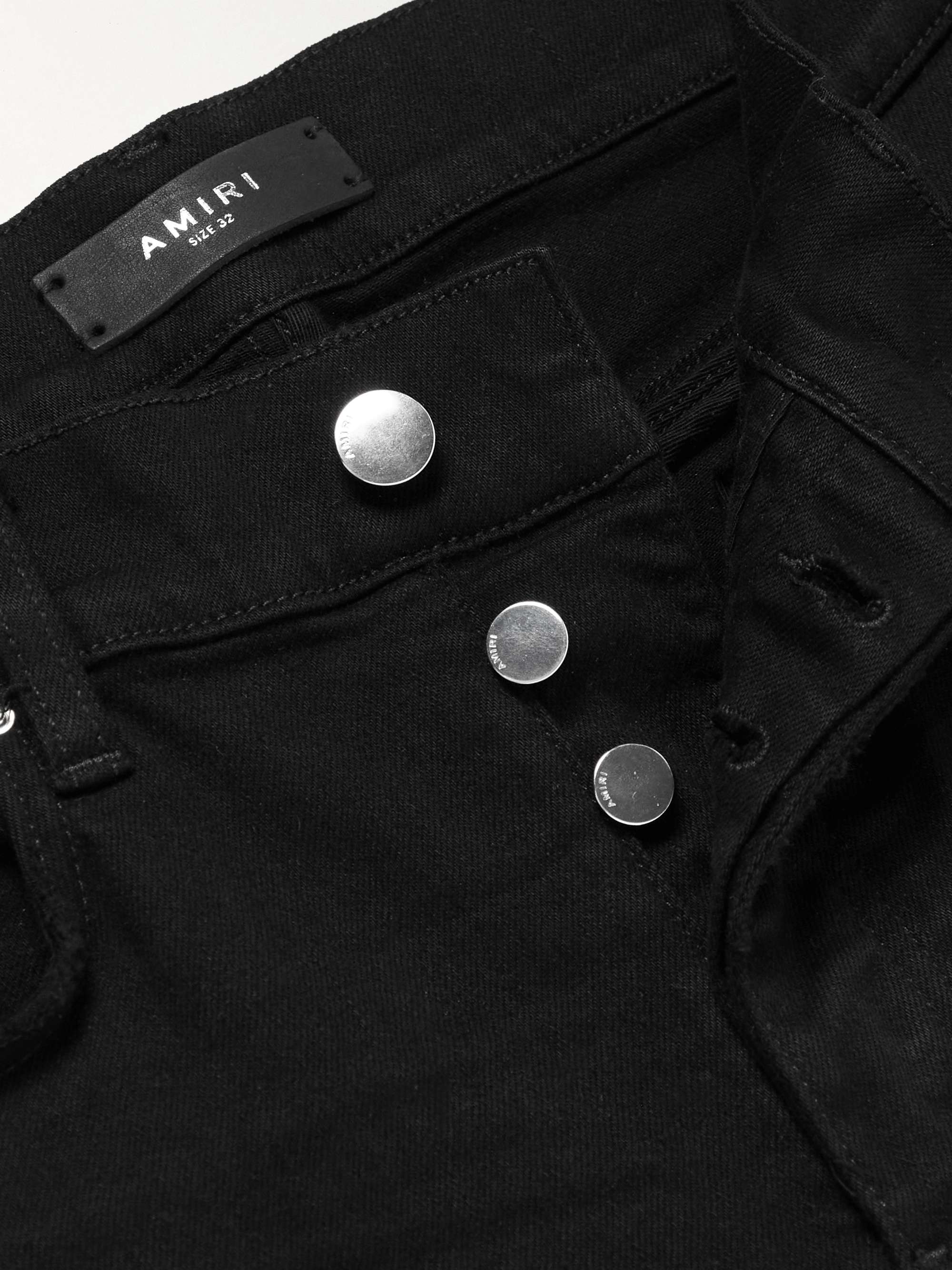 AMIRI Skinny-Fit Leather-Appliquéd Panelled Distressed Jeans