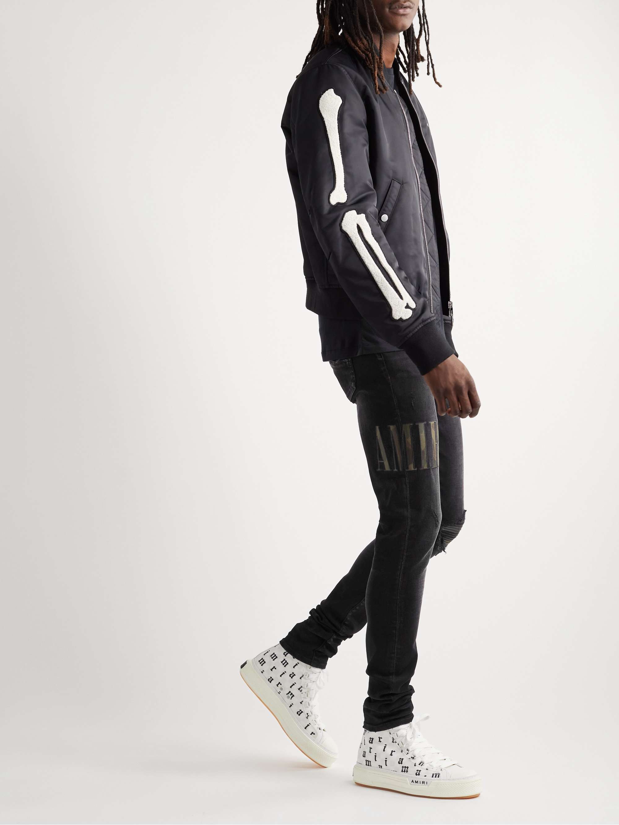 AMIRI Leather-Trimmed Appliquéd Skinny Jeans