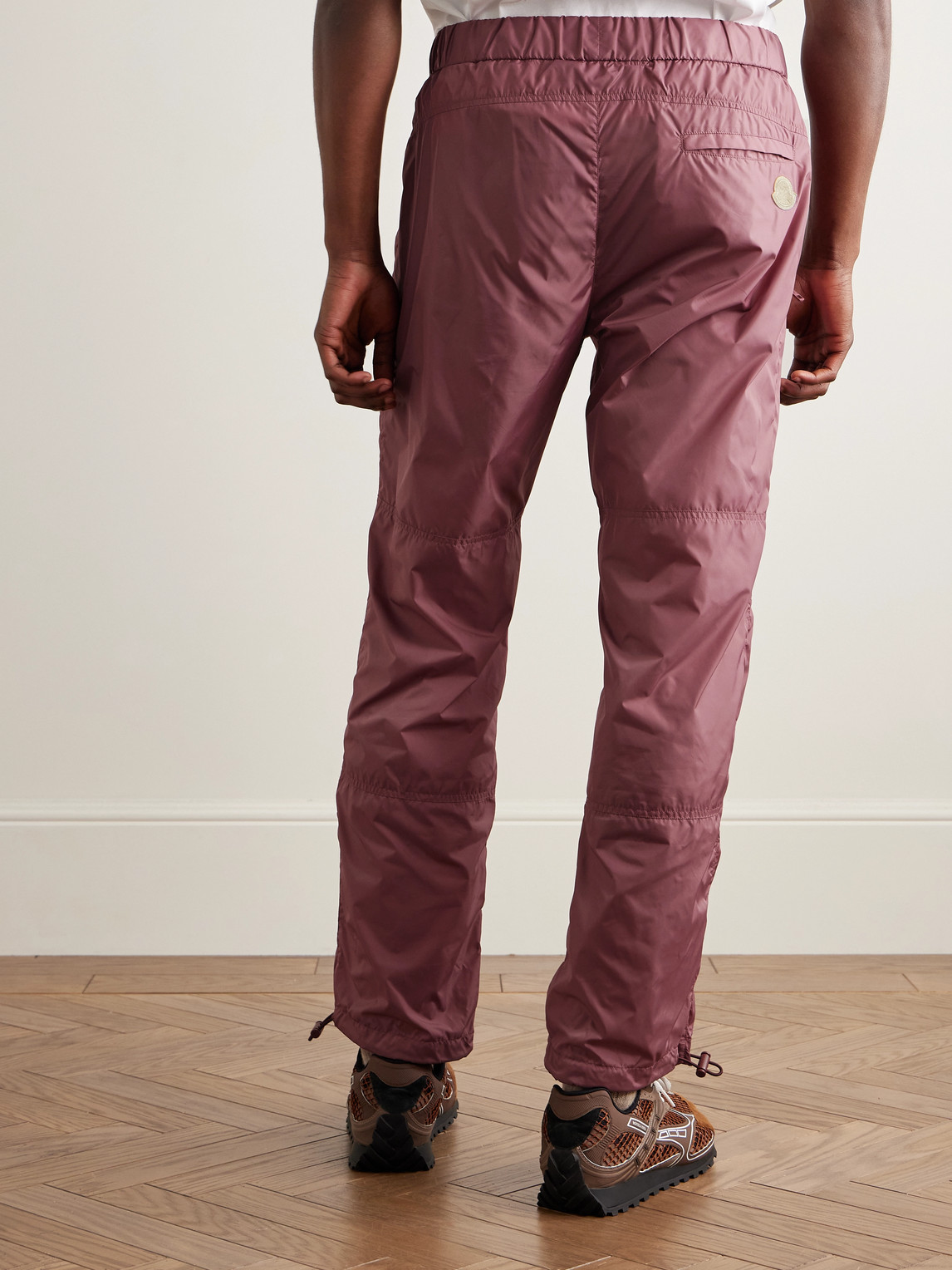 Shop Moncler Genius 2 Moncler 1952 Tapered Logo-print Shell Trousers In Pink