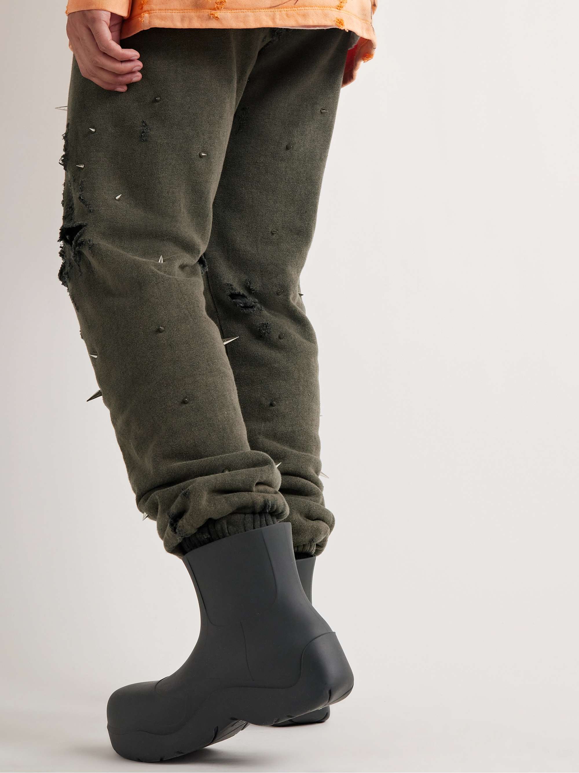 LIBERAL YOUTH MINISTRY Tapered Studded Distressed Cotton-Blend Jersey Sweatpants