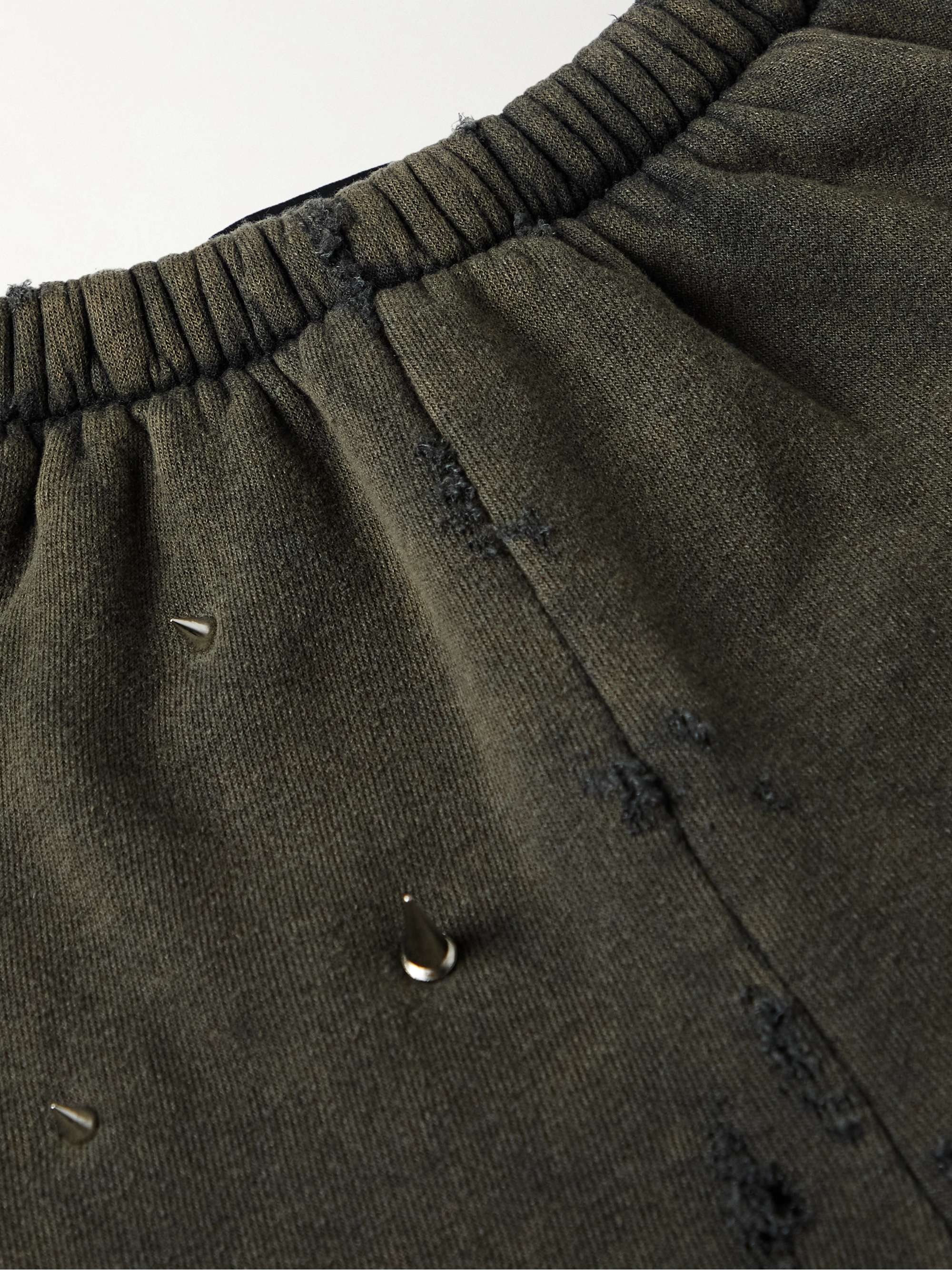 LIBERAL YOUTH MINISTRY Tapered Studded Distressed Cotton-Blend Jersey Sweatpants