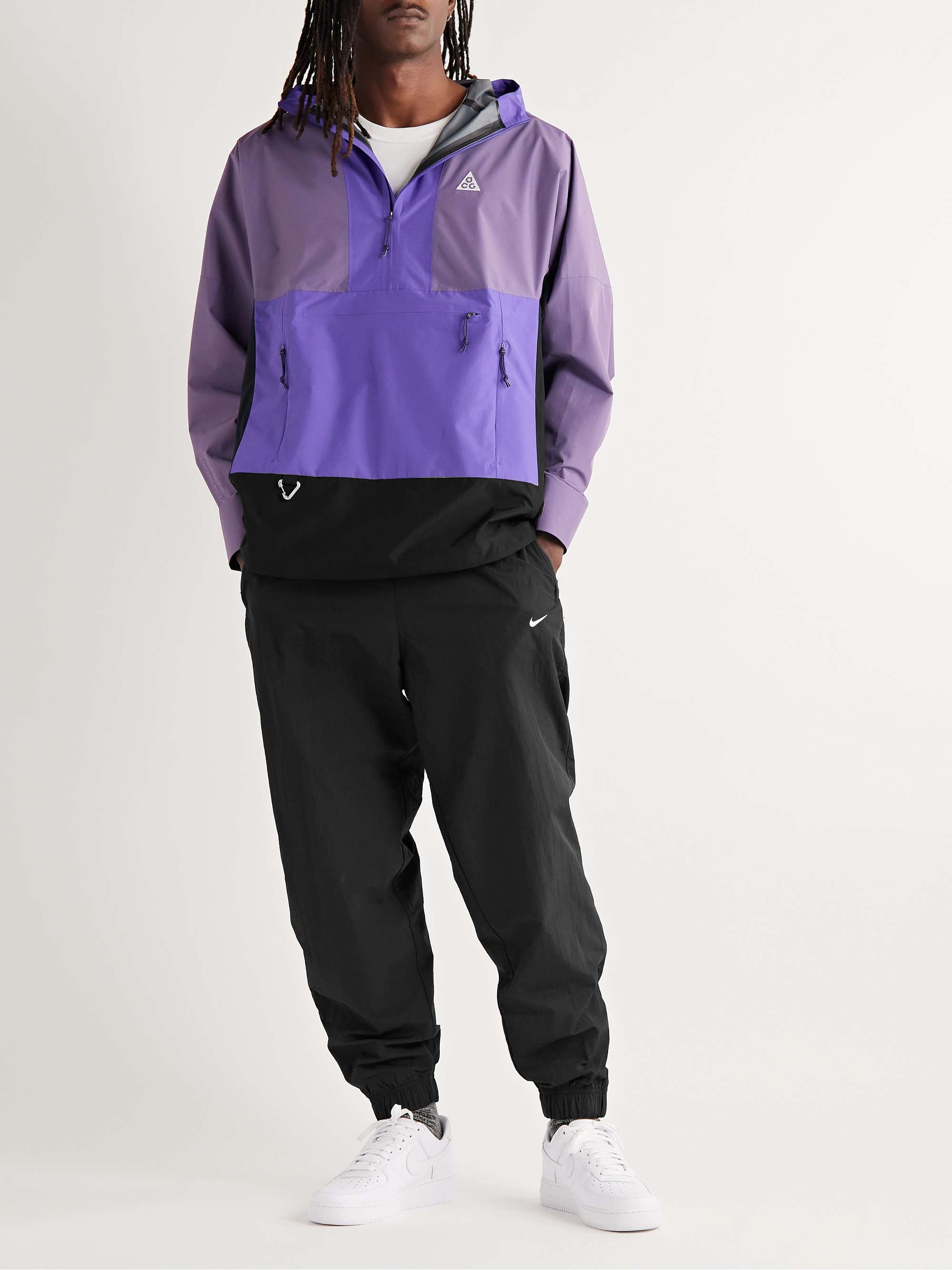 NIKE Solo Swish Tapered Logo-Embroidered Shell Track Pants